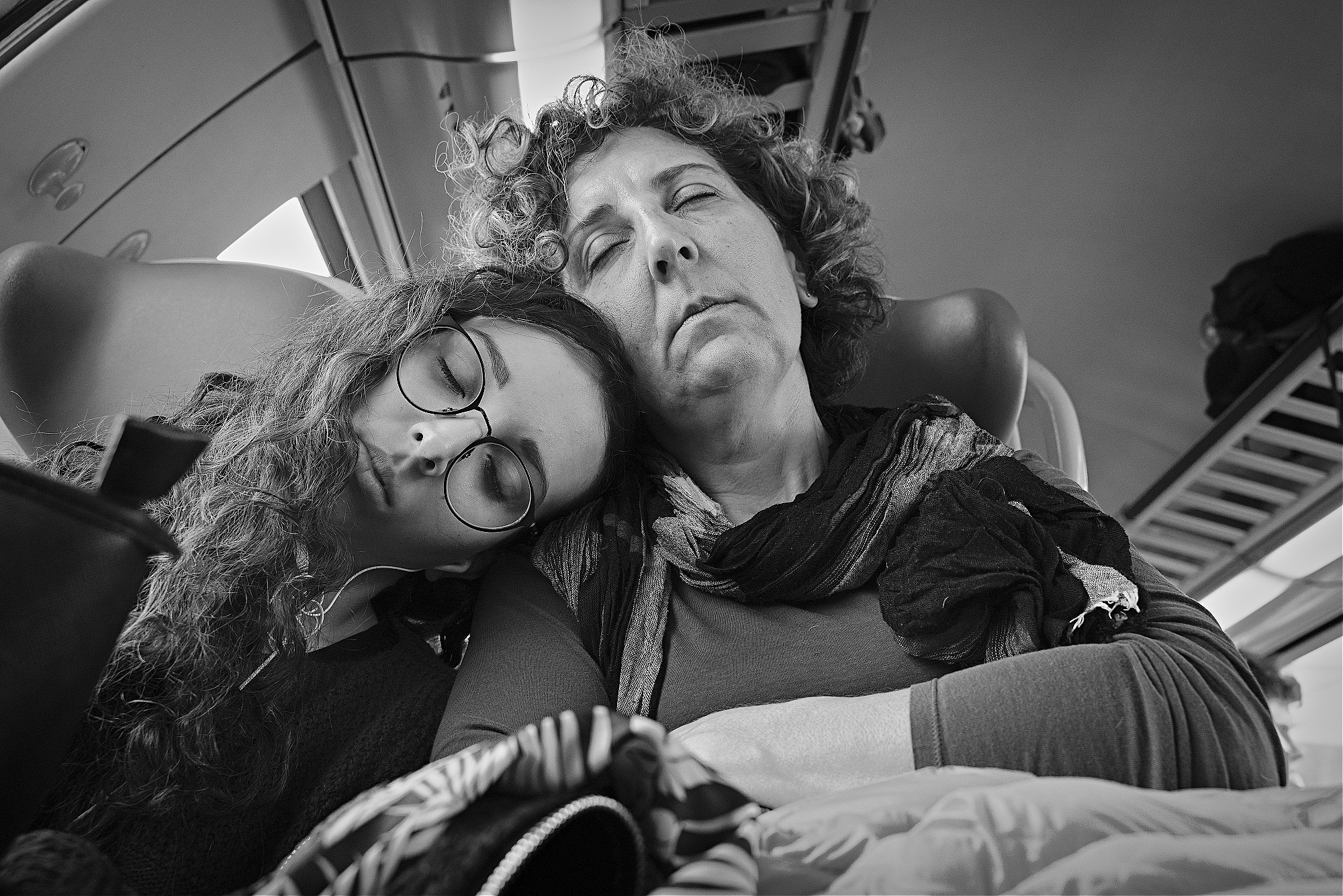 Sleepers on the sleepers, On the train between Milan and Verona