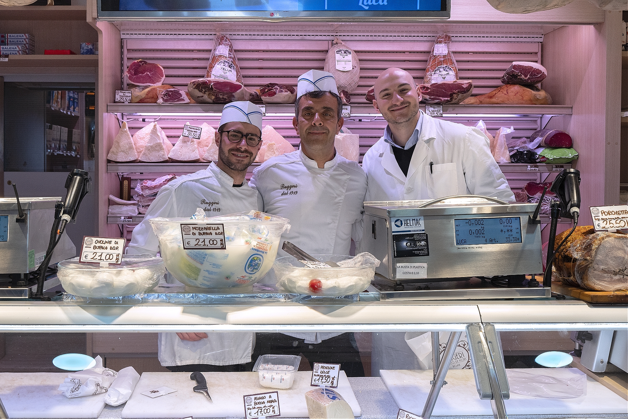 Delicatessen staff st Salsamenteria Ruggeri in Campo de Fiori, Rome