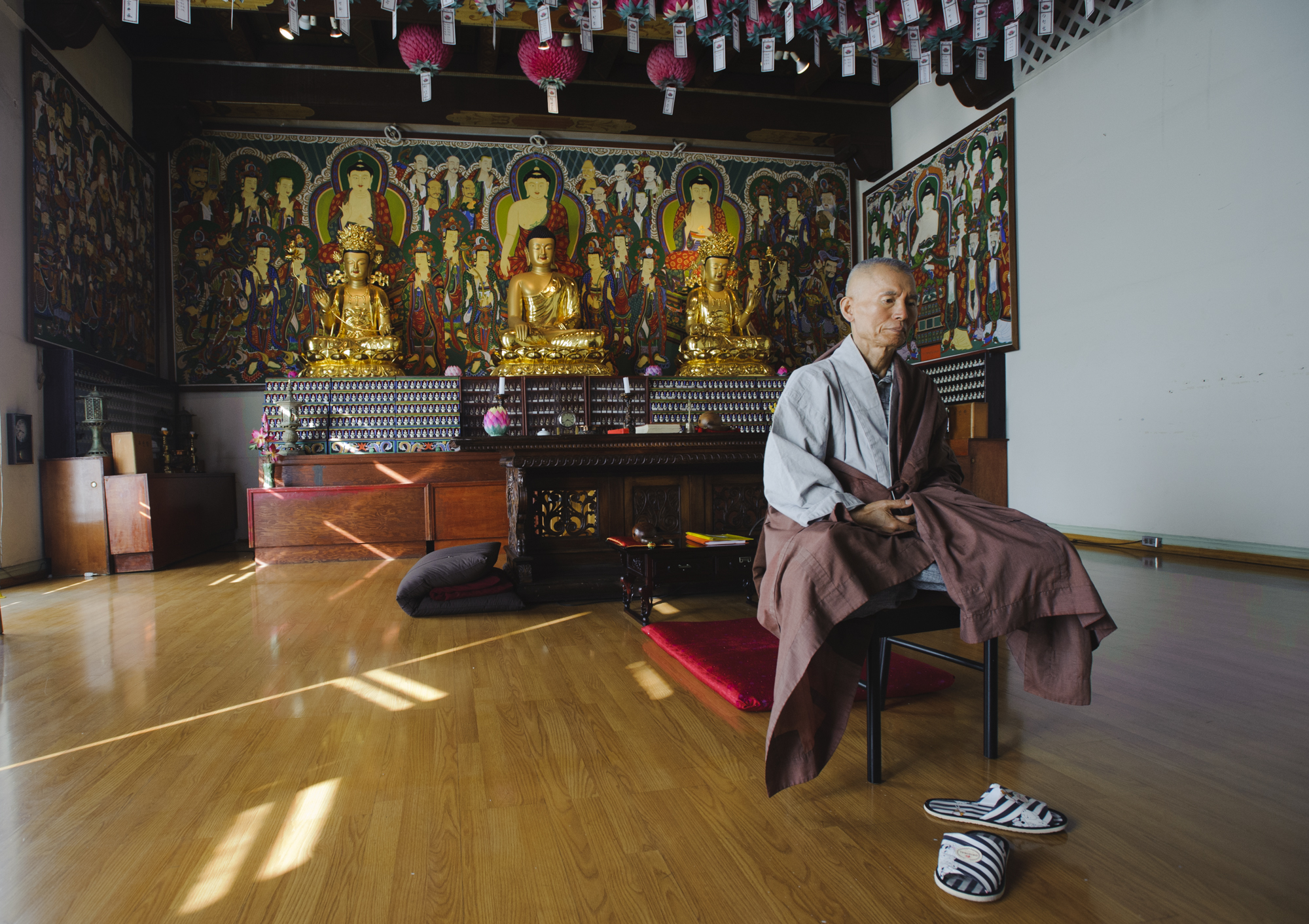  Meditation Master Daeryun poses for a portrait at the Korean Buddhist Culture Center on Oxford Avenue and 3rd Street. He has taught meditation for 35 years and leads services at the center every Sunday as well as private services with individuals wa