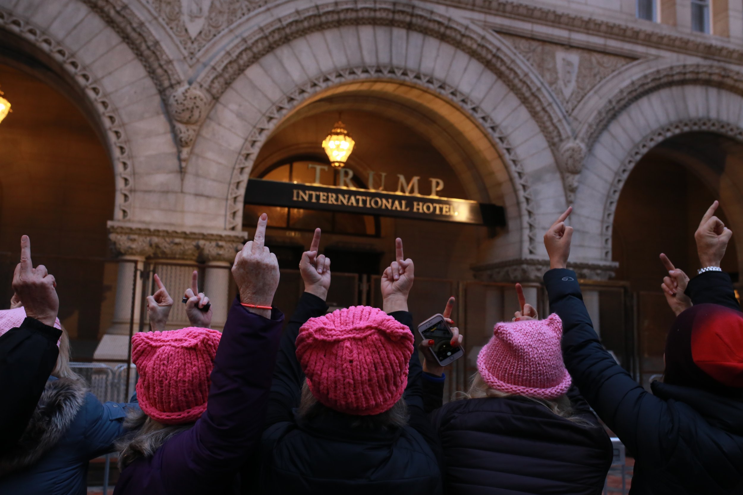  The Naglieri family flip off Trump International Hotel during the Womens March On Washington. ‬"He's made it permissible to be vile, so we're being vile," said Jack Naglieri. "I don't normally stand on the street flipping people off but if he wants 