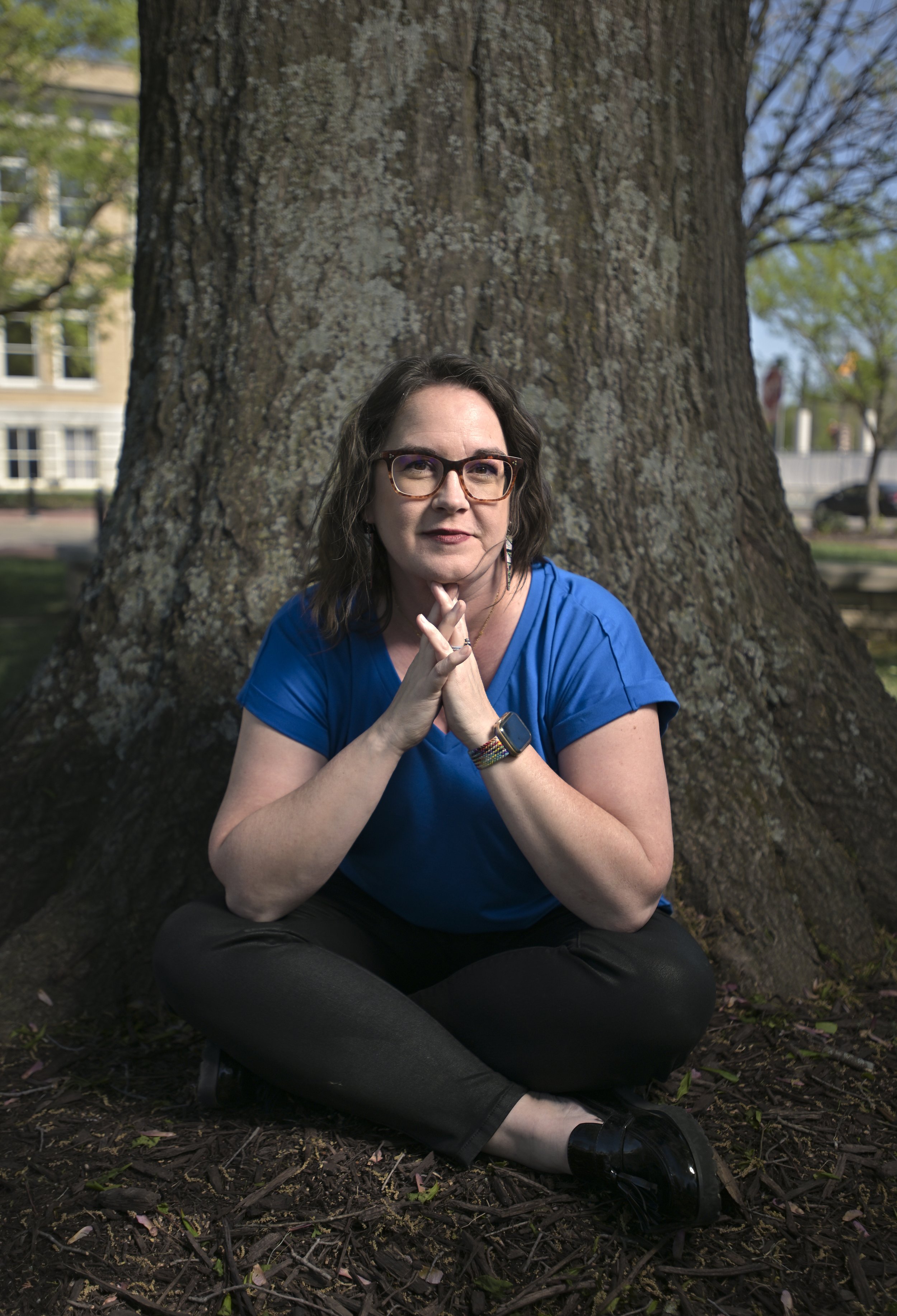  Alison Nail-Malone poses for a portrait at the downtown square in Bentonville, Monday, April 17, 2023.  Nail-Malone is a death doula and grief counselor. 