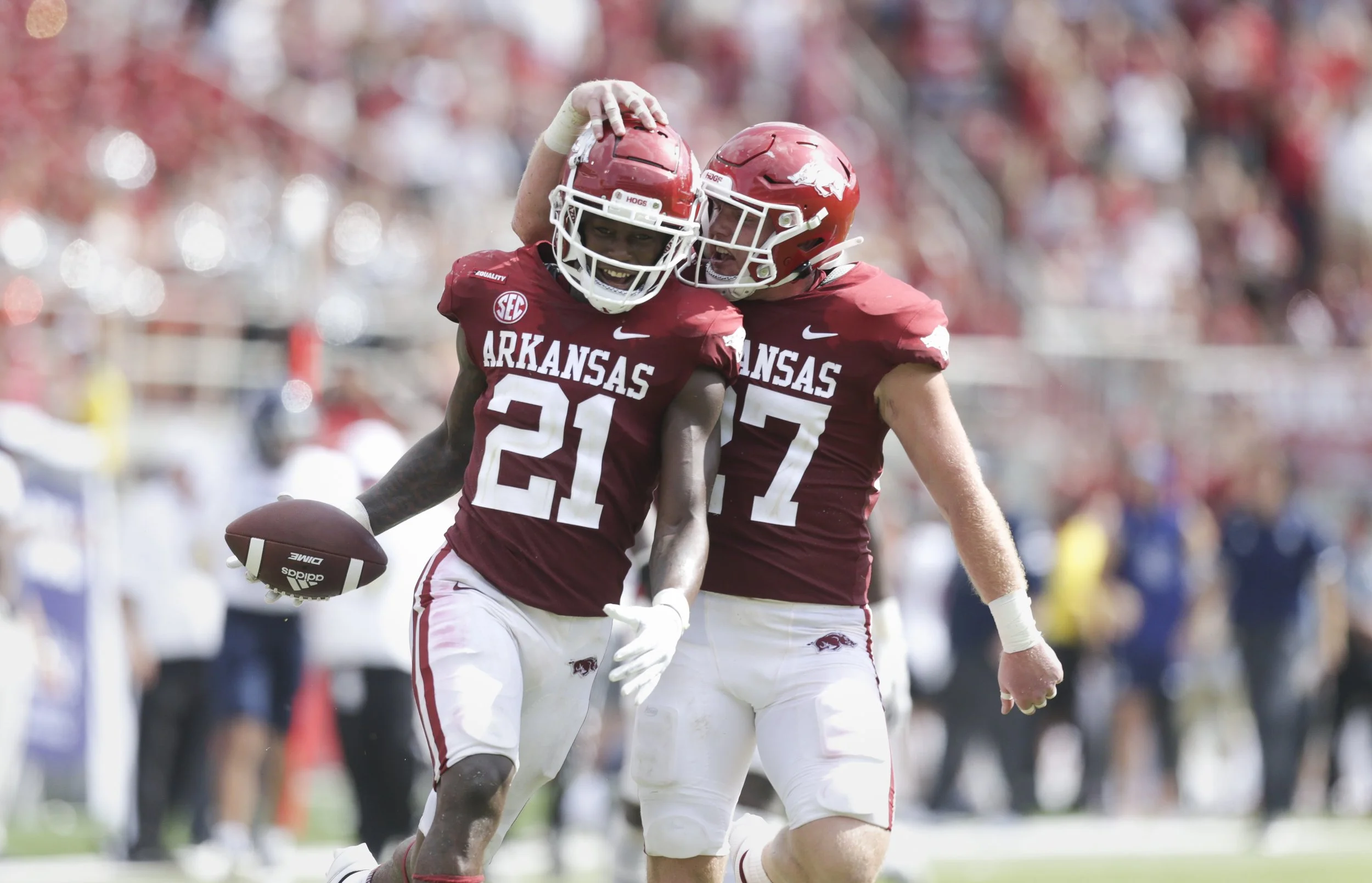 Arkansas defensive back Montaric Brown (21) reacts after intercepting a pass intended for Rice wide receiver August Pitre III (88), Saturday, September 4, 2021 during the fourth quarter of a football game at Donald W. Reynolds Razorback Stadium in F