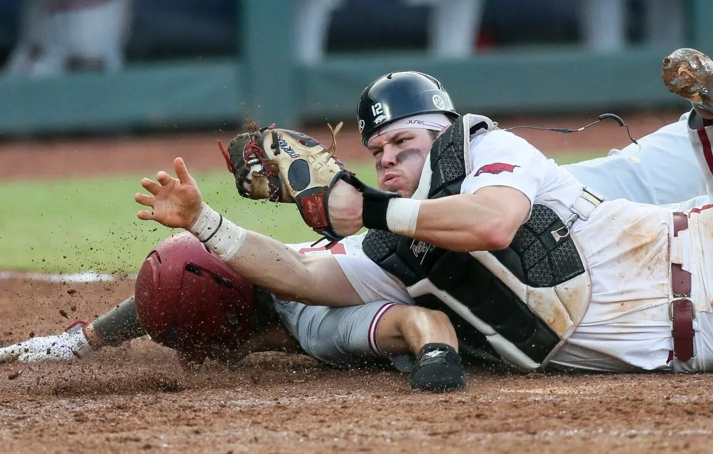  Arkansas Michael Turner (12) forces out Alabama infielder Drew Williamson (18), Wednesday, May 24, 2022 during the fifth inning of the SEC Baseball Tournament at the Hoover Metropolitan Stadium in Hoover, Ala. Arkansas fell to Alabama 4-3.  