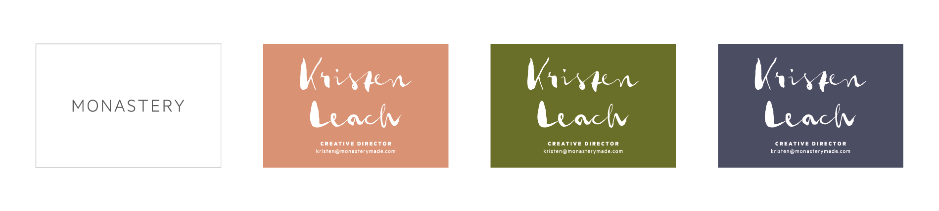 Business cards made with the three primary brand colors