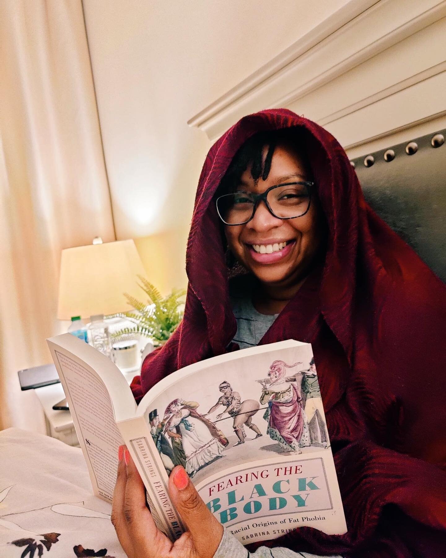 Hubby caught a photo of me in my happy place last night: book, bed, pyjamas, fluffy socks, shawl, kids in bed, quiet time. Heaven.