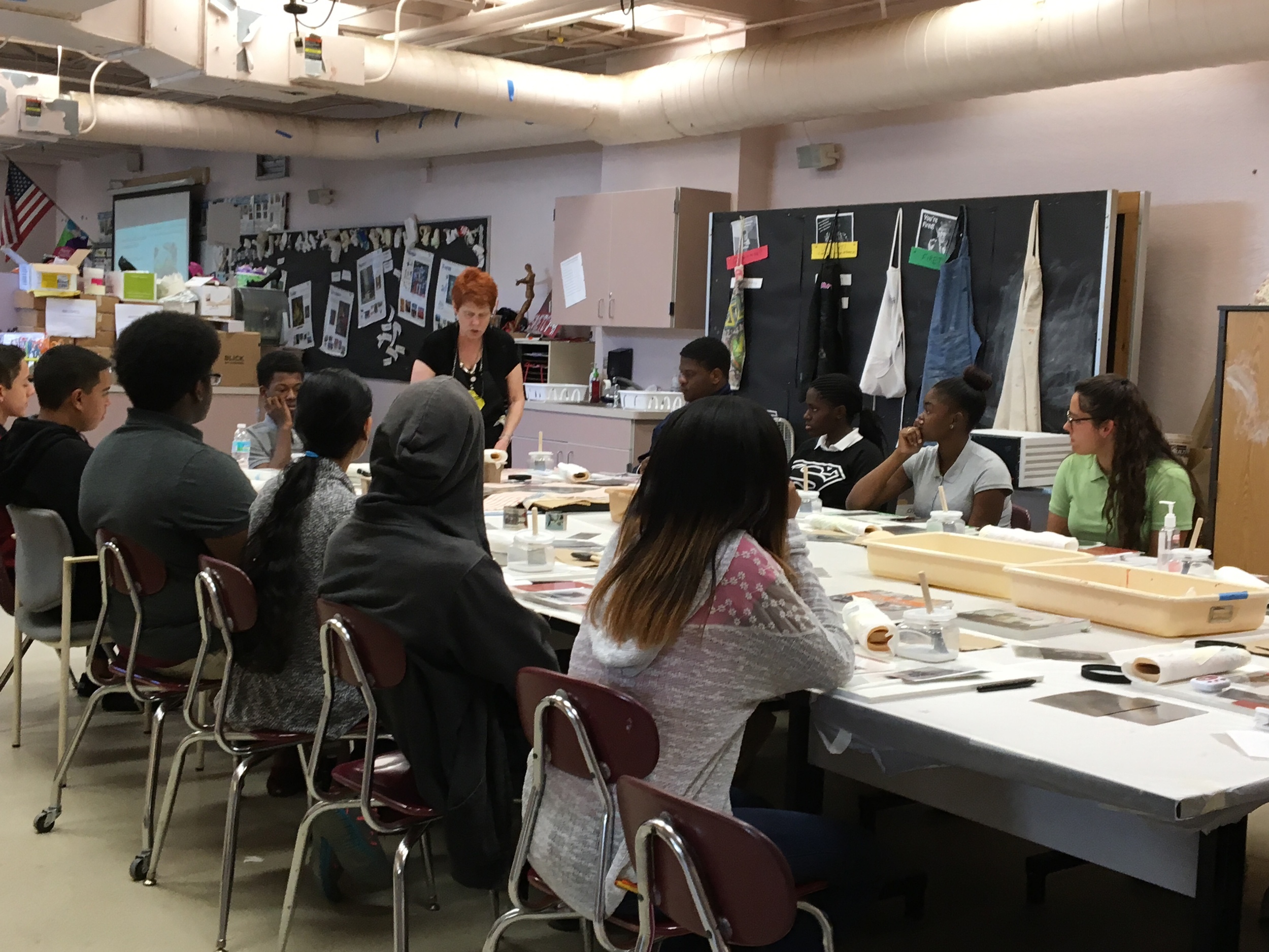 Students learning DASSART™ Photo transfer system to make their selfies on metal.