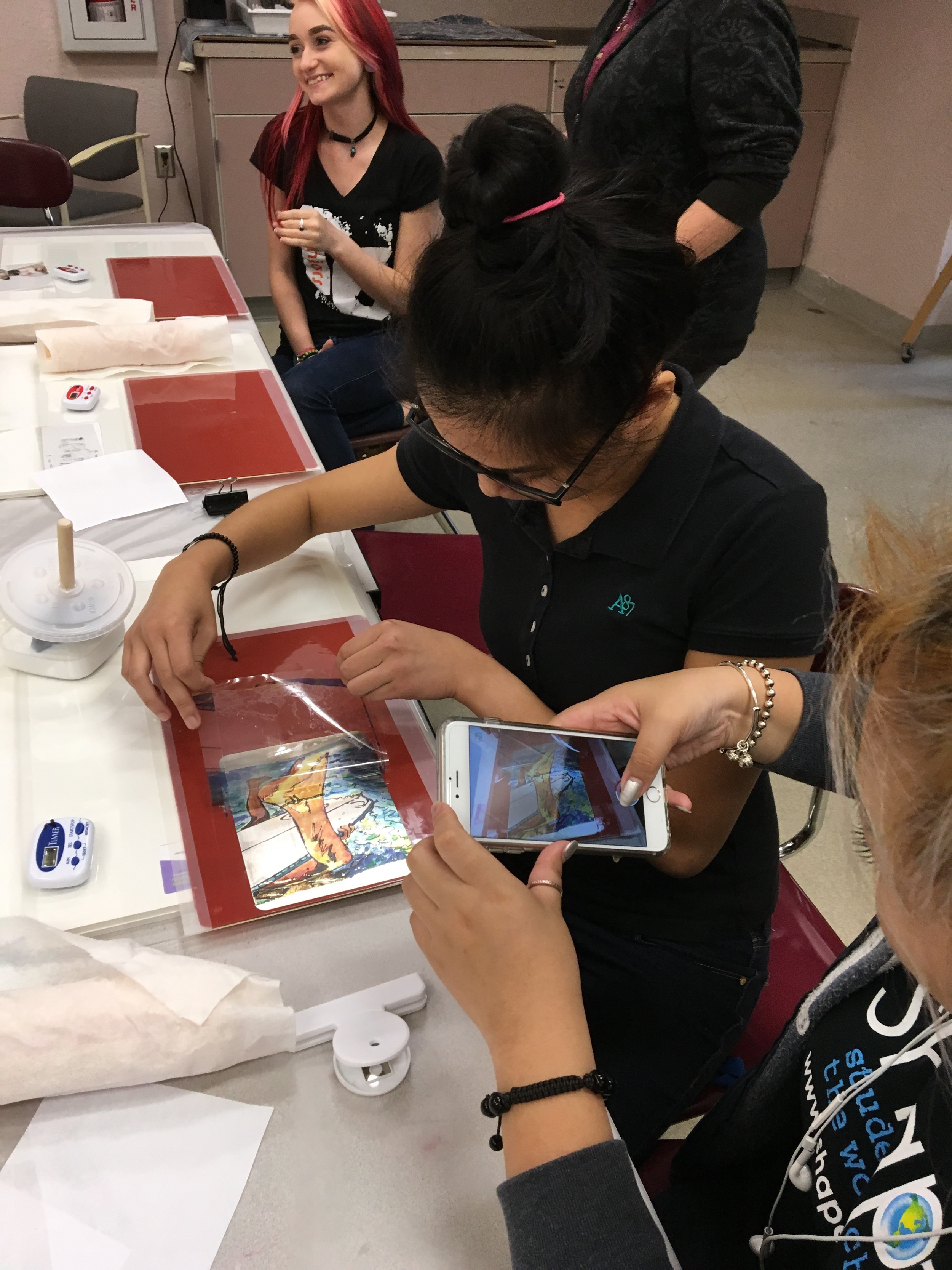 Students transferring images.
