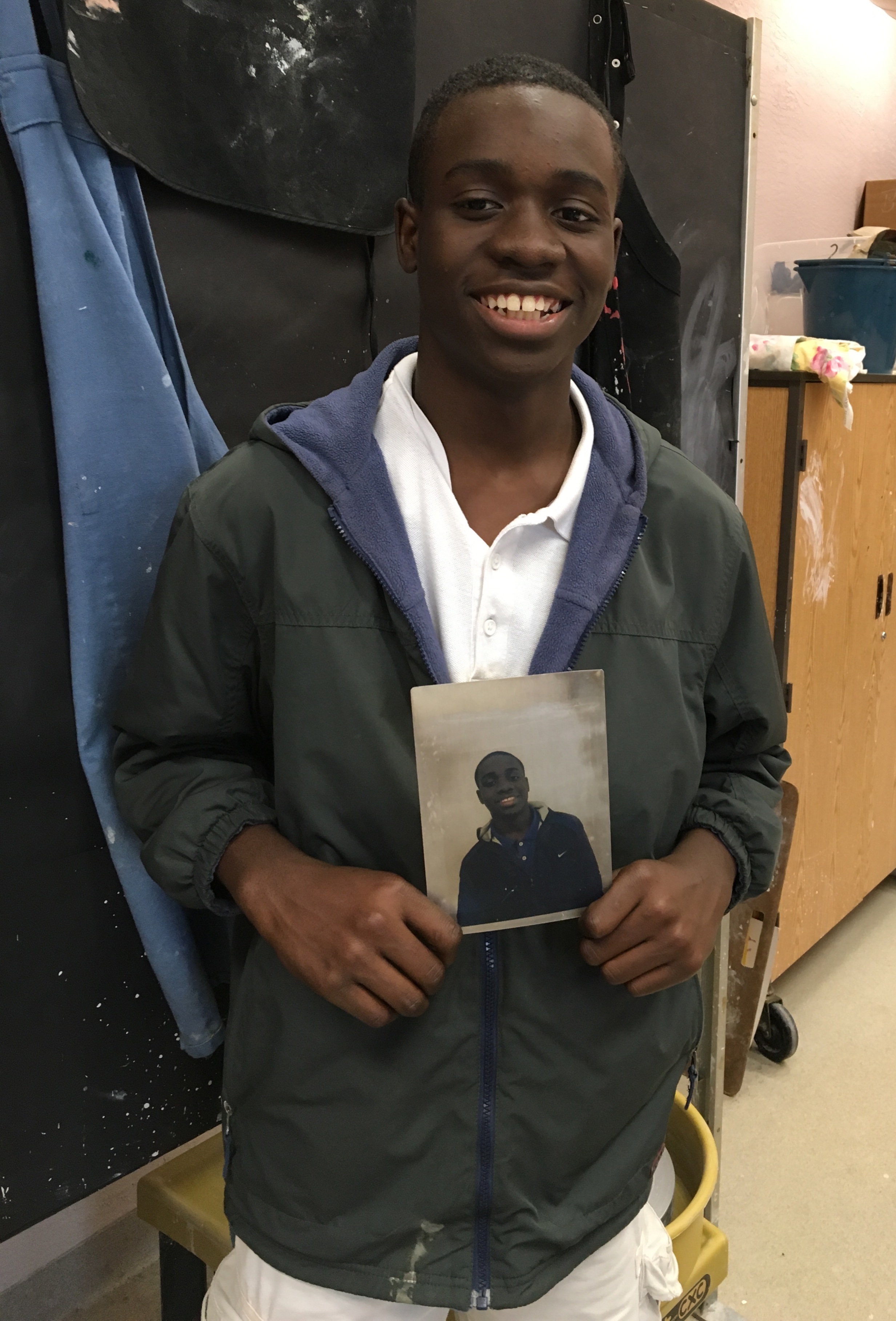 Student with his photo transfer image.