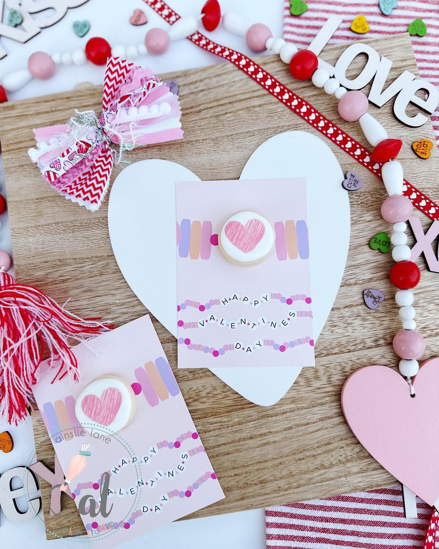 Favorite cookie card this year! 
&bull;
&bull;
&bull;
&bull; #valentinescookies #valentinesday #friendshipbraceletcookies #ainslielanecookiestudio #sugarcookiemarketing #lodicookies #decoratedcookies #cookiesofinstagram