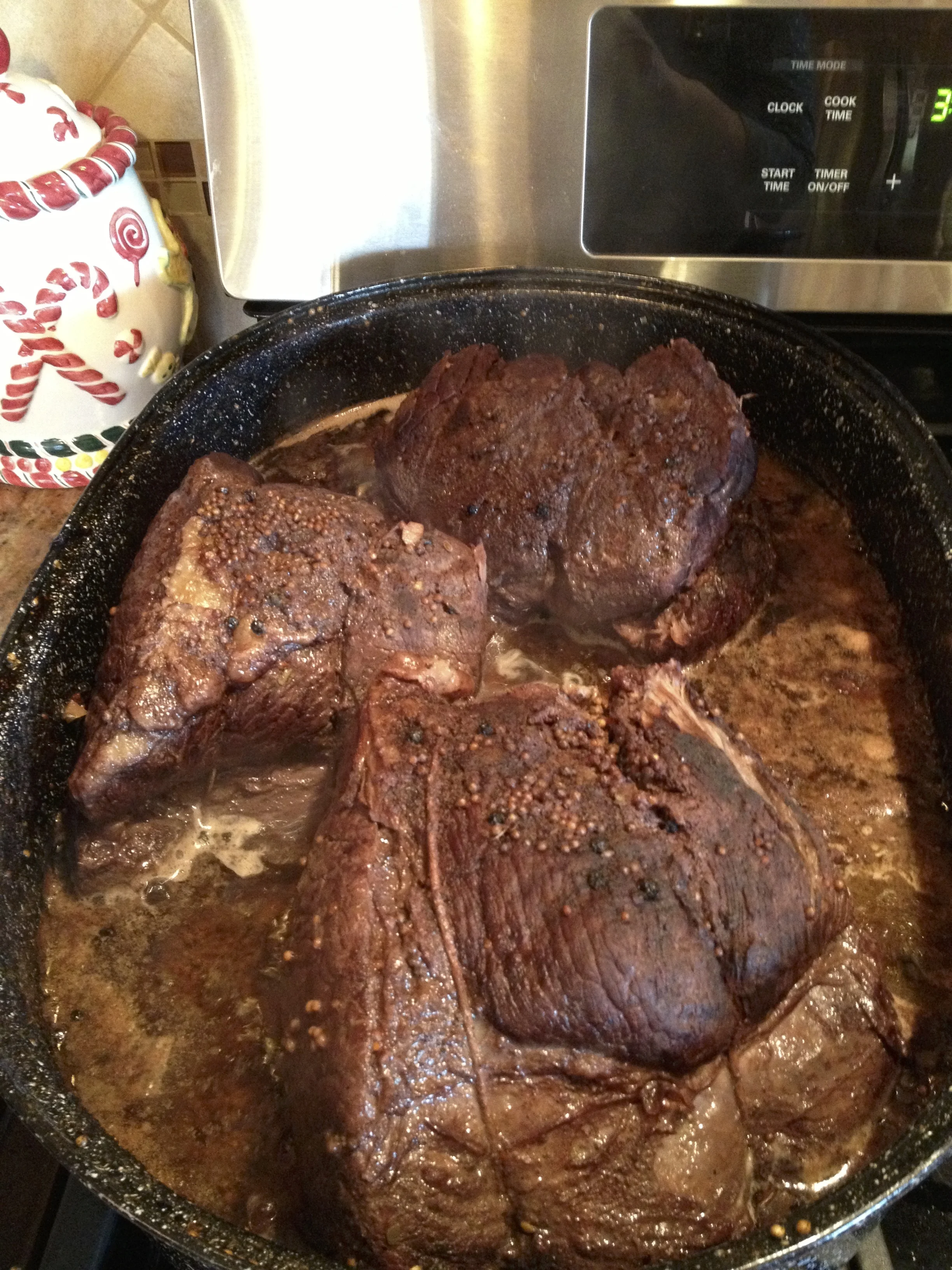 Sauerbraten is viewed as the national dish of Germany. It literally translates to sour meat. Not necessarily appetizing, I know but trust me it is delicious. We let ours brine for about a week in a mixture of vinegar, red wine and pickling spices (peppercorns, chili flakes, mustard seeds, allspice, cloves, ginger and coriander). Think of it as a pungent, pickled pot roast which we then top with a sweet gravy made by crumbling gingersnap cookies into the remaining brine and pan drippings. 