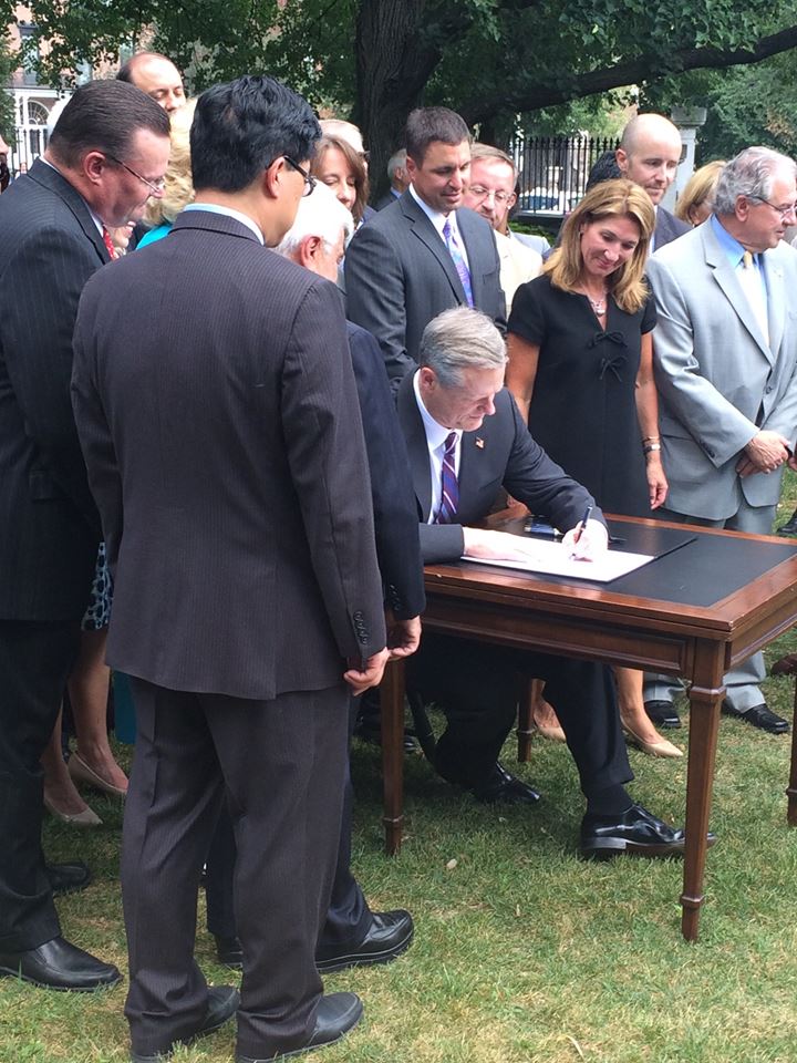 Governor Charlie Baker Signs the Energy Omnibus Bill on August 8, 2016. Our President Richard Andre was present at this Ceremony.