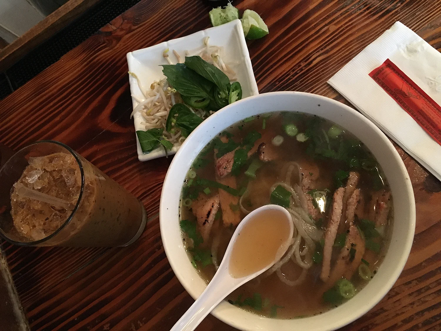 My favorite vietnamese restaurant, Saigon Shack. It sounds like a jenkie spot, but it's one of the BEST in NYC. If you are ever in NYC, stop by Saigon Shack ! What you are looking for is pork chop pho.