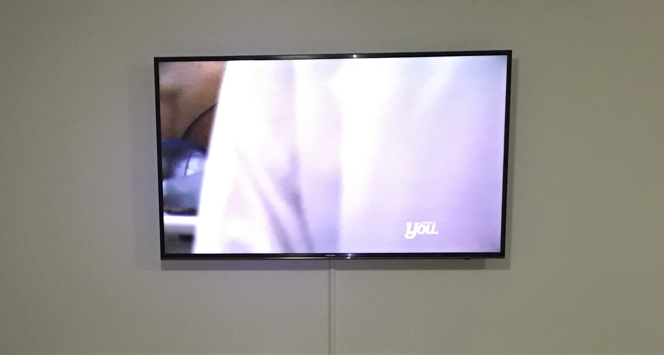 TV mounted to a wall in a home in Toowoomba 