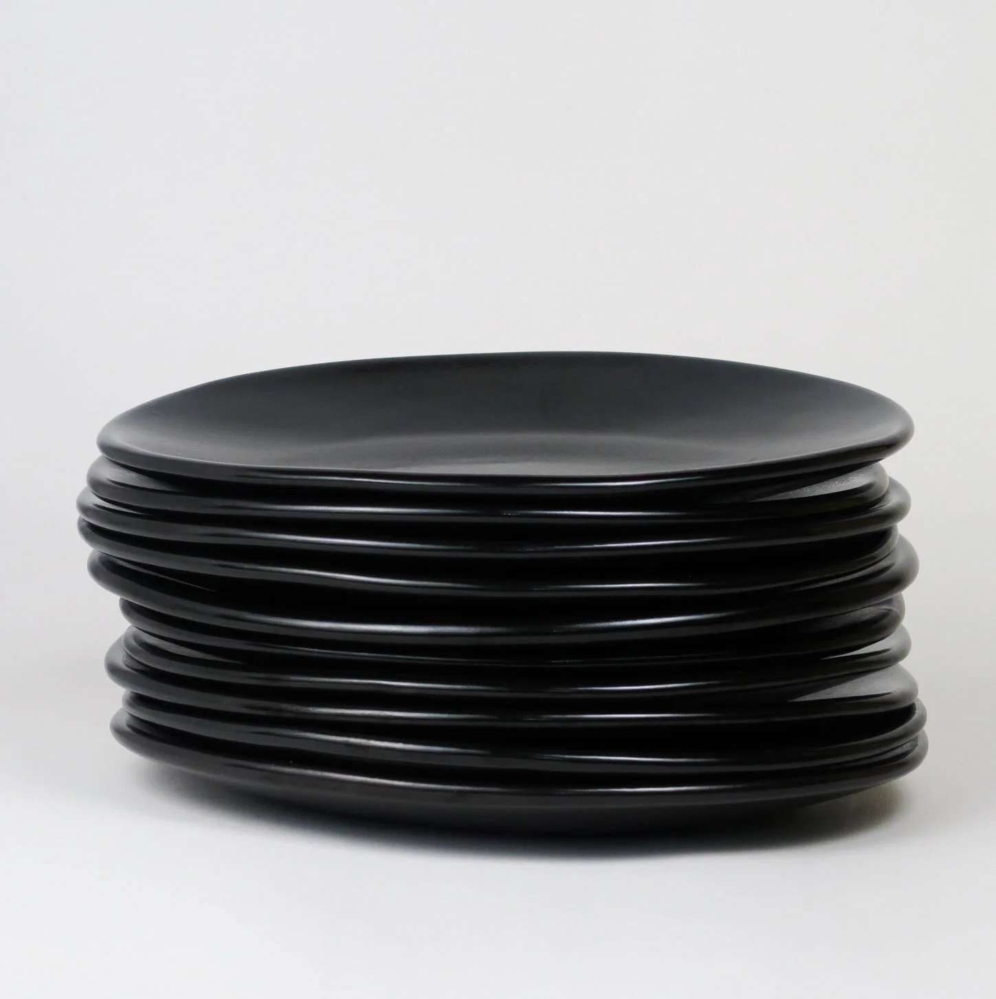 sexy-black-dinner-plates stack-c-stoll.jpg