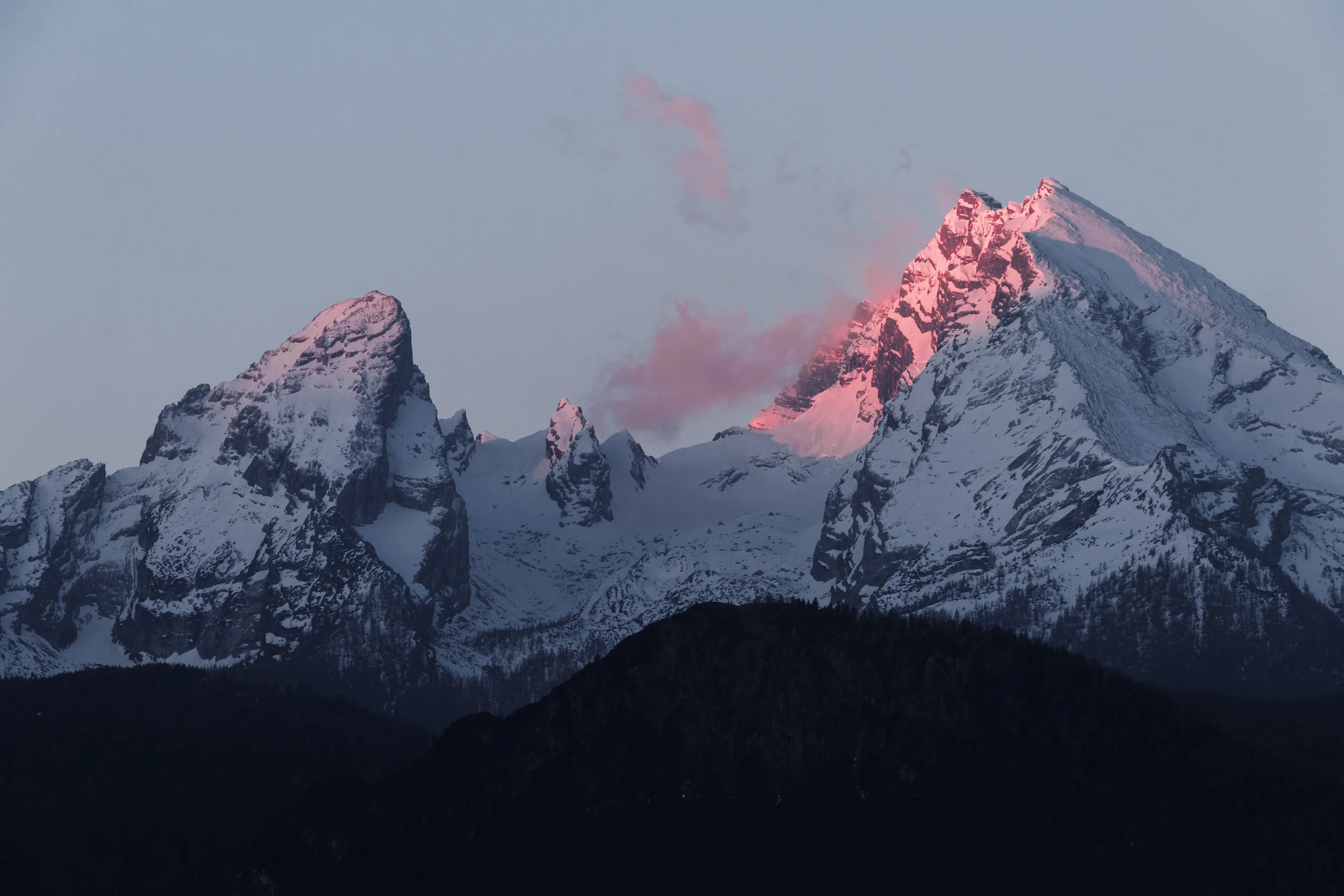 The massiveness of the mountain in this image - bearing the blanket of snow as spectacular hues from the sun reflect its body - evokes a sense of impenetrable and immovable strength and stature. A mountain’s quiet, resolute immensity leaves us in awe and inspires us to reach for greater heights. Yet, it can also pose challenges. The firm base of the mountain evolves to the narrower crest in its attempt to reach the sky. More daring individuals become enamoured by the peak and see it as something to conquer, although it can never truly be conquered. When the mountain feels threatened in some way or simply shrugs its shoulders, the strength exhibited can wreak havoc for all beings caught on its skin. It makes no sense to deny the strength you have at the cost of allowing yourself to be reactive and subject to external influences far beyond what is healthy for you. Imagine yourself as a mountain of strength, solidly ground in the Earth, your head held high as if you were touching the sky. Do so without straining, just as the mountain itself does not strain. - “ Mountain Strength” from Earth Magic Oracle Cards by Steven D. Farmer, PH.D