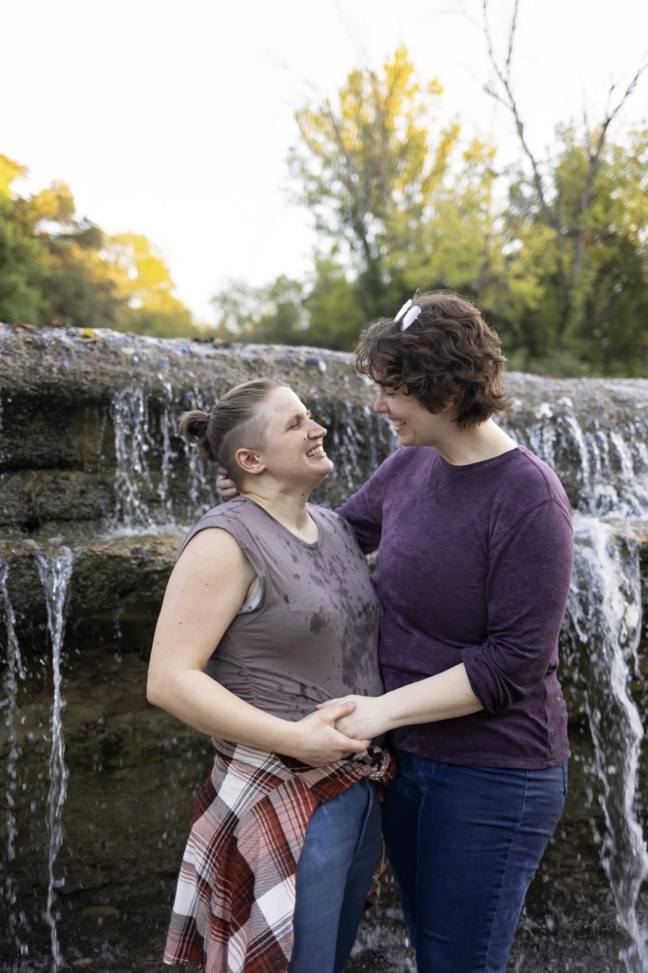 lgbtq-couples-creek-laughing-portrait.jpg