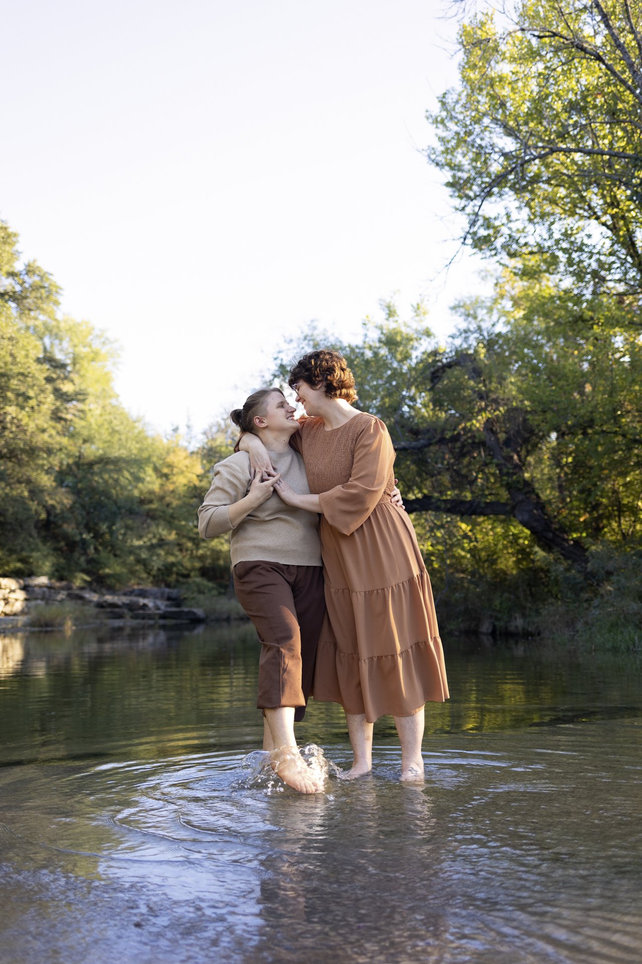 romantic-couples-creek-embrace-portrait.jpg