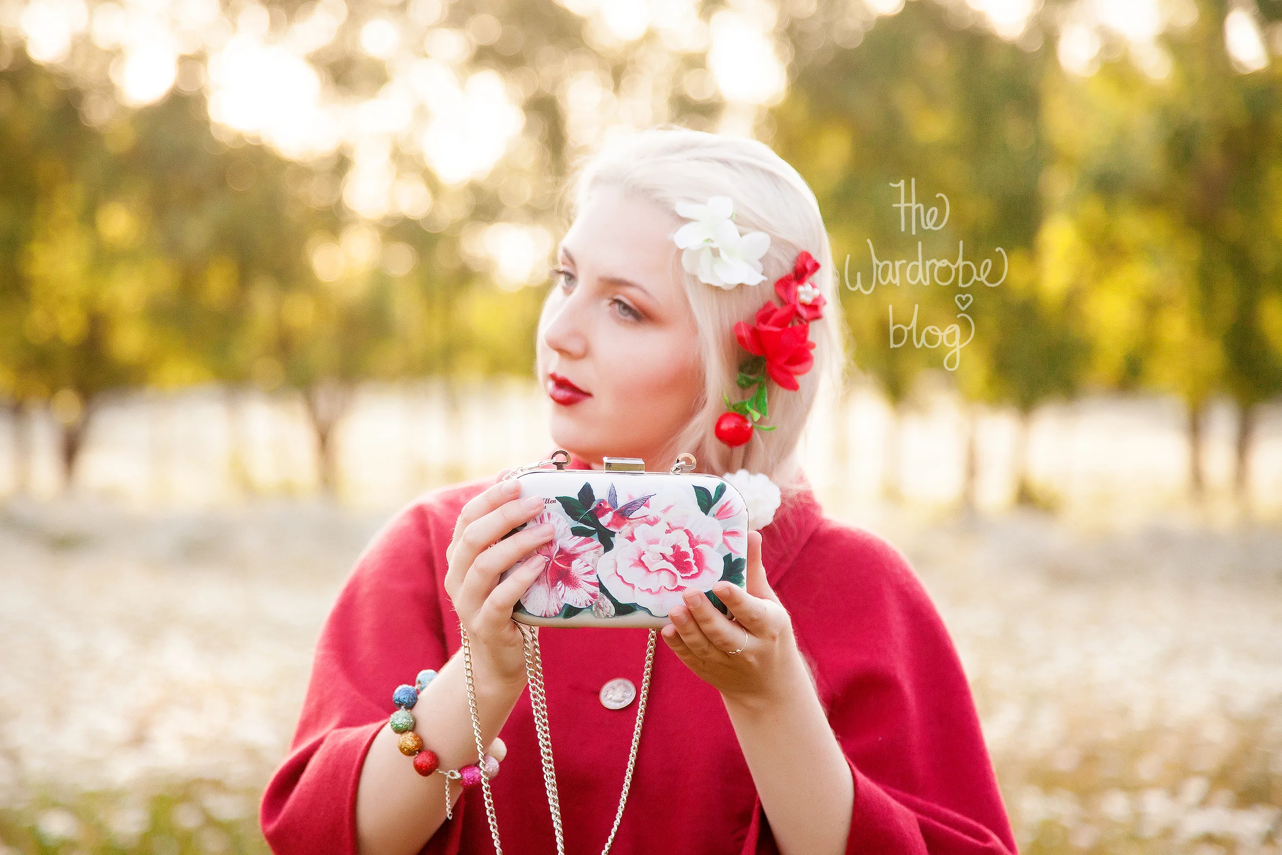 Mantle from Valleygirl, Dress from Just Jeans, Choker + Earrings from Lovisa, Bags from Moxie Mama Wear,&nbsp;Hair flowers + Bracelet from  Shop The Wardrobe .