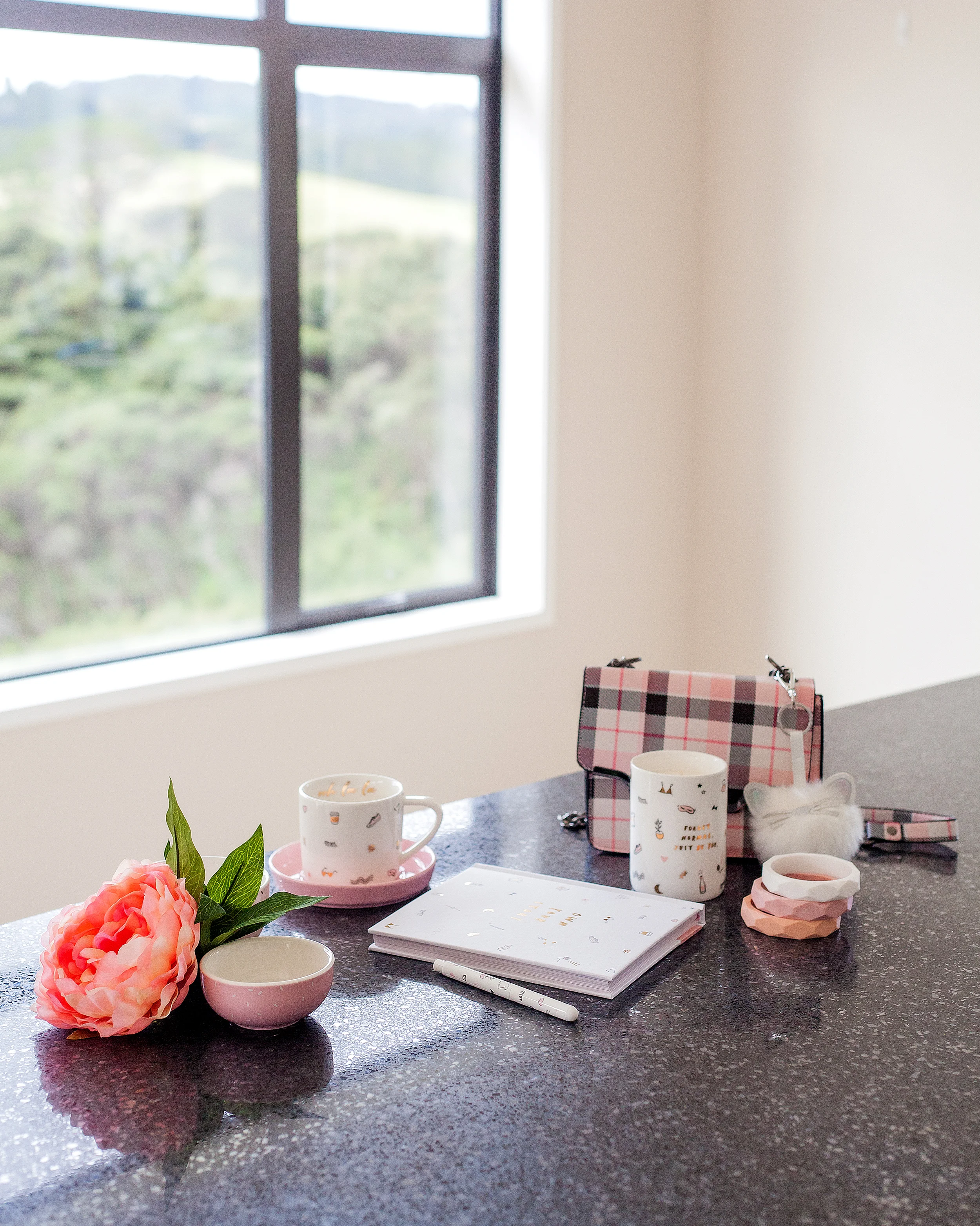 Stationary set from Kikki.K including mug and candle. Bangles from Kmart and Bag with Key Chain from Colette Hayman. 