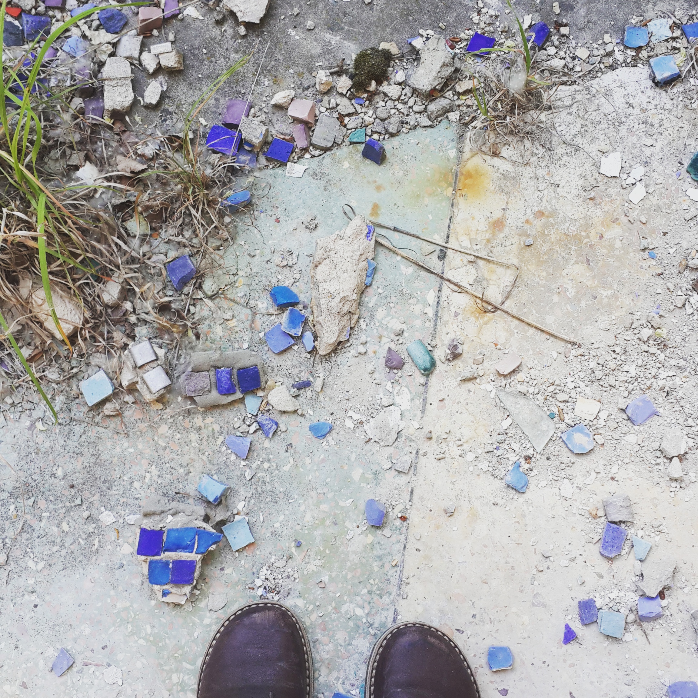 Shattered tiles from a mosaic mural.