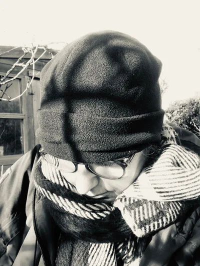 Wrapped up drawing in the cold