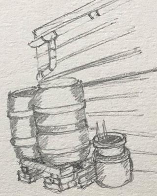 Water butts against a shed