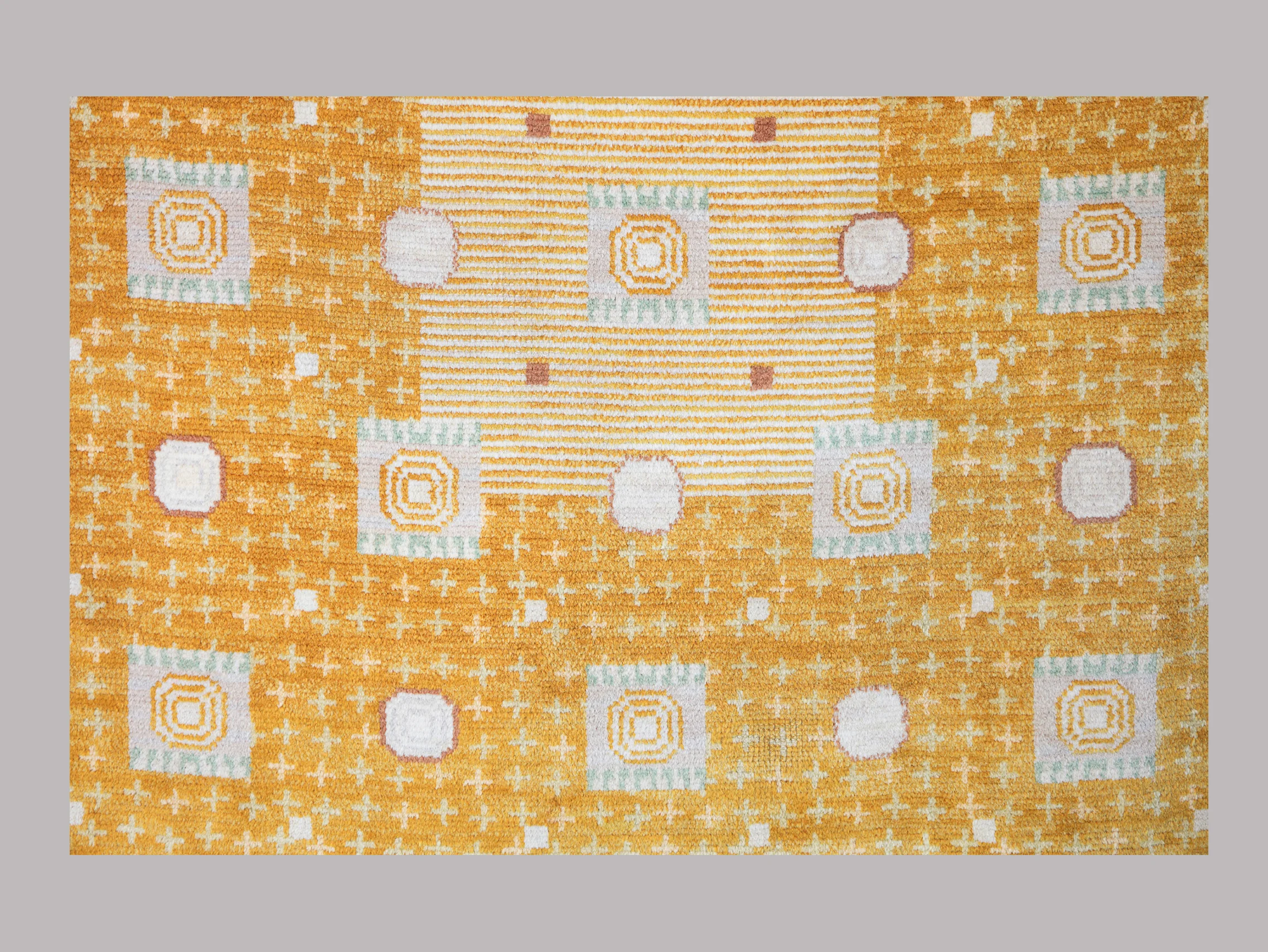 Barbro Nilsson for AB Märta Måås-Fjetterström "Kullager", 1945 Carpet, knotted pile 355 x 280 cm “There’s nothing as a carpet by Märta Måås-Fjetterström or her follower Barbro Nilsson, who took over the flourishing business in the forties. Around that time, Barbro Nilsson designed this carpet called "Kullager", ball bearing, a Swedish invention by the engineer Sven Wingqvist. This one is yellow and as far as we know, the only one of its kind. It’s said this particular carpet was commissioned for the SKF director himself for his office in Gothenburg.”