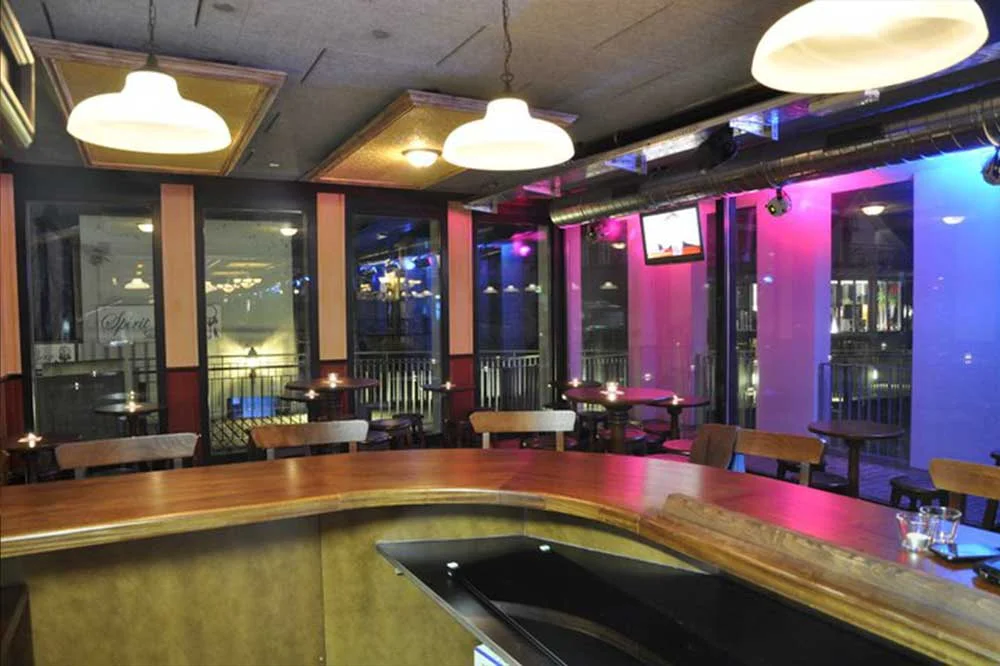 Peggy O'Neil's authentic Irish pub design - interior wooden bar from barman's perspective&nbsp;