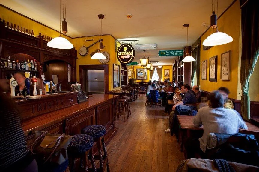 Trinity Irish Pub design - interior view of bar and seating