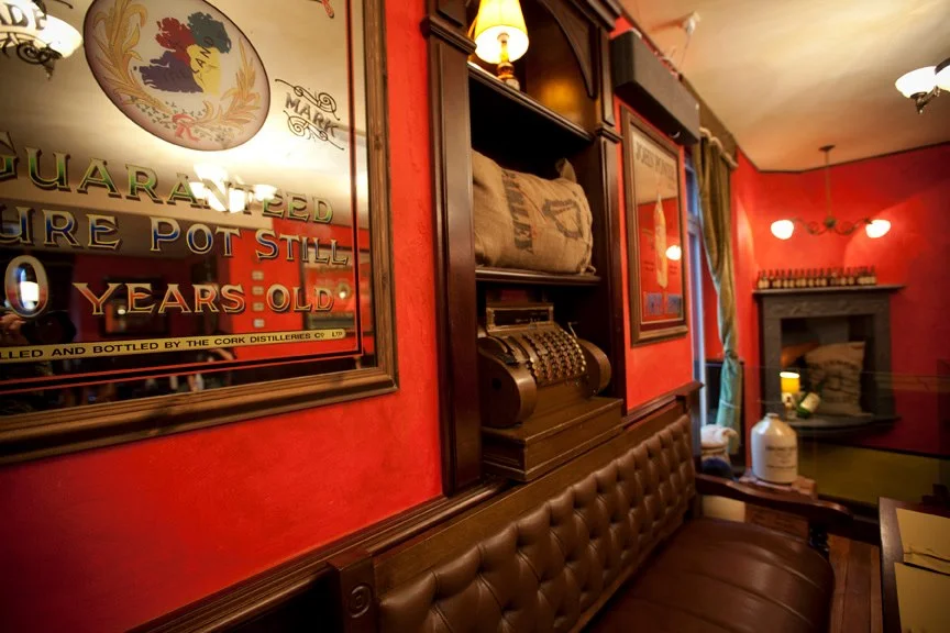 Trinity Irish pub design - authentic Irish mirror with map of Ireland, hession Guinness bag and Irish trinkets&nbsp;