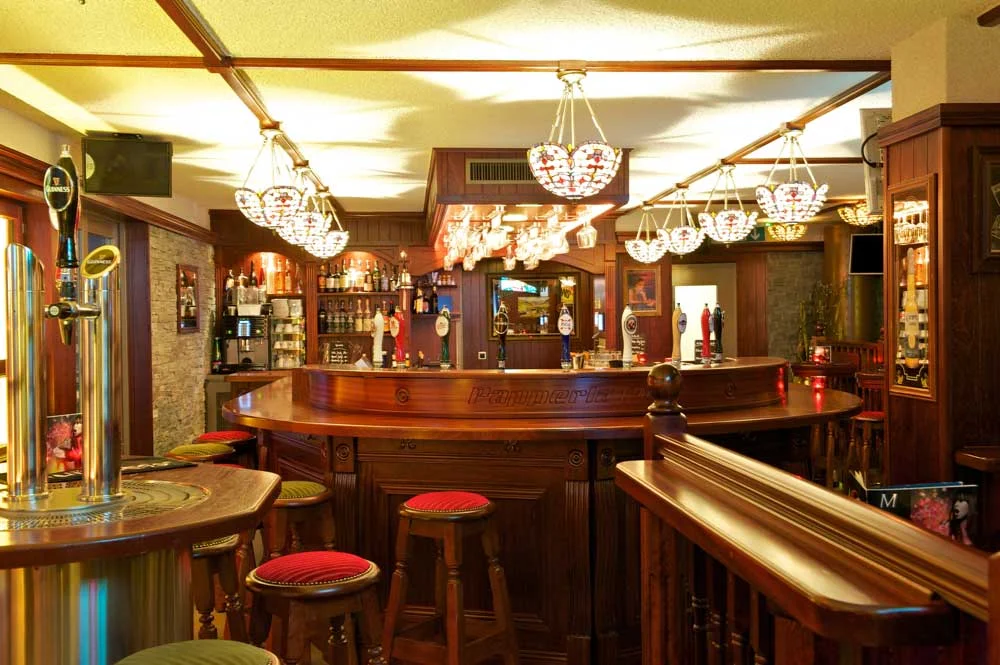 Papperla authentic Irish bar design - interior view of wooden, round bar