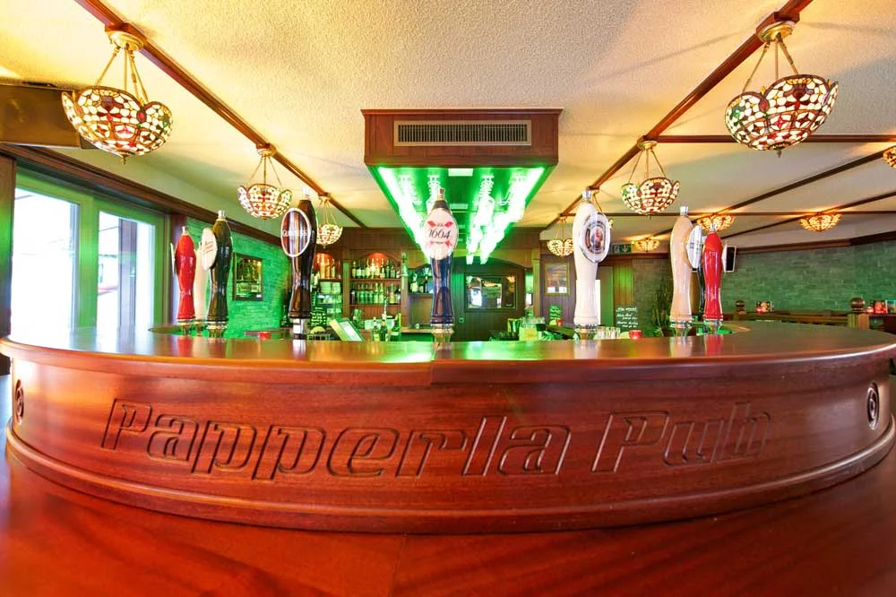 Papperla authentic Irish pub design - wooden bar with 'Papperla Pub' engraving&nbsp;