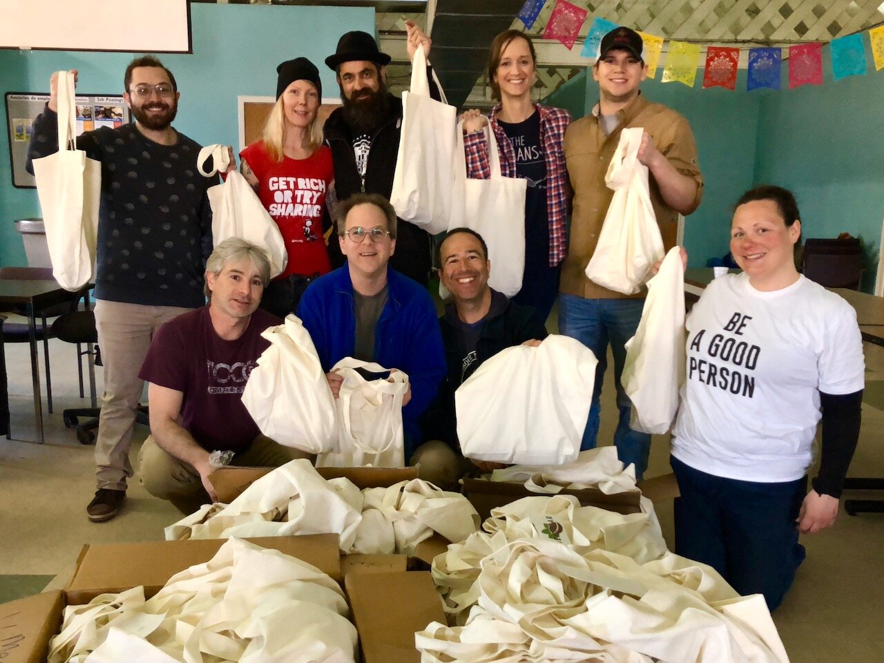 The Hemp for the Homeless team with freshly filled Hemp Help Kits at Denver Homeless Out Loud in 2019.