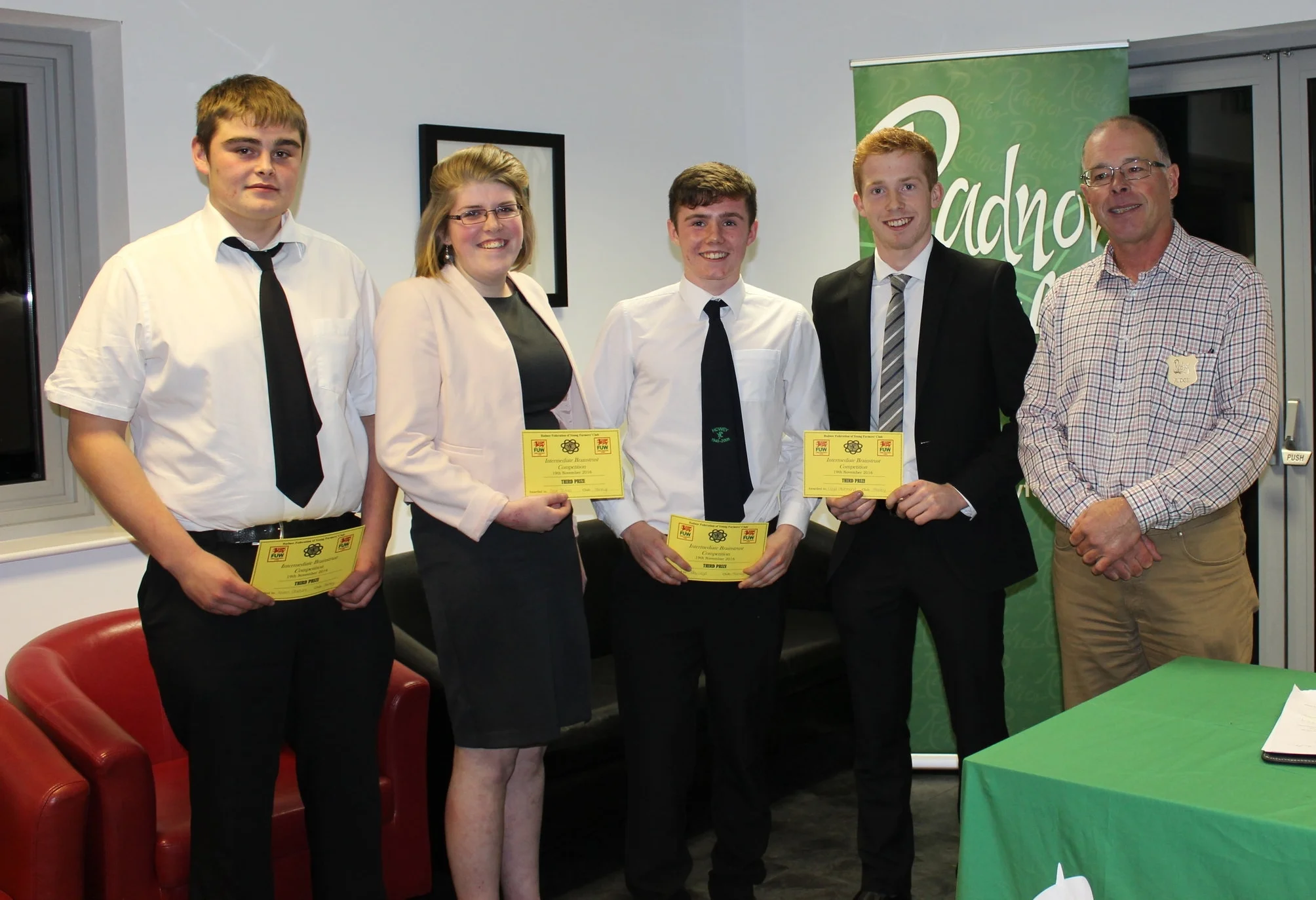3rd Place Intermediate Brainstrust Ieuan Griffiths, Clare James, Toby Lloyd & Lloyd Hammond, Howey YFC with Judge Mr Ifor Humpreys.