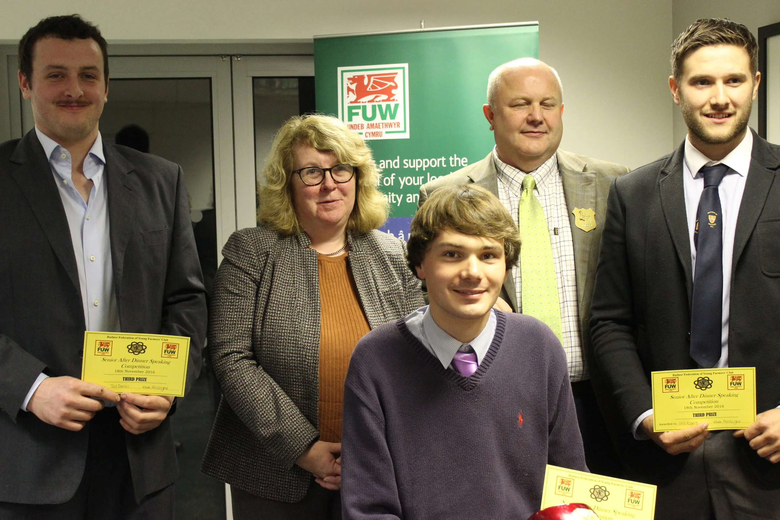 3rd Place in the After Dinner Speaking competition Ted Davies, James Mitchell & Will Rogers, Presteigne YFC with judges Stuart & Karen Anthony.