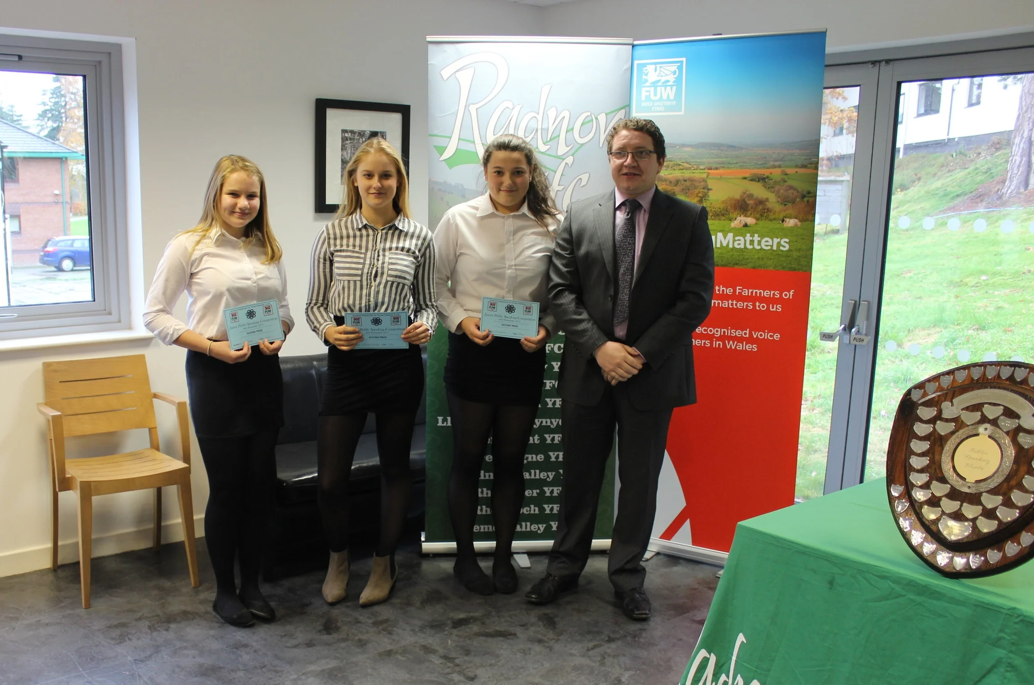 Eve Watkins, Emily Davies & Gemma Halstead, Dolau YFC with judge Hefin Jones gaining 2nd place.