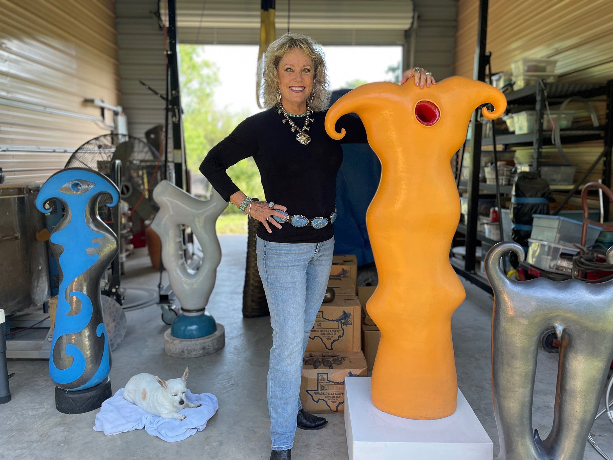  Susan Budge in studio with  Psyche , 2023, glazed stoneware, 52 x 28 x 8 inches. Photo by Rick Paulson. 