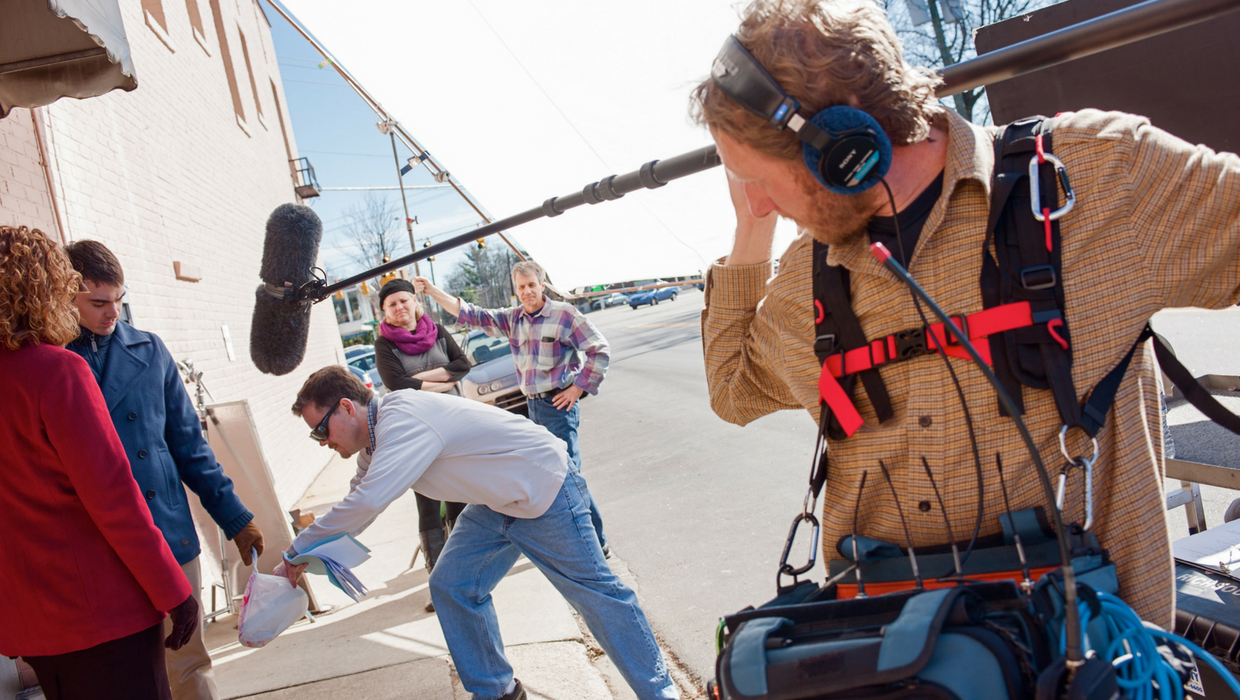 Writer-director Lance Bacon makes sure every visual detail is right while sound designer Richard Walters manages the boom on set of "Oh Crappy Day." Photo by Griffin Davis.