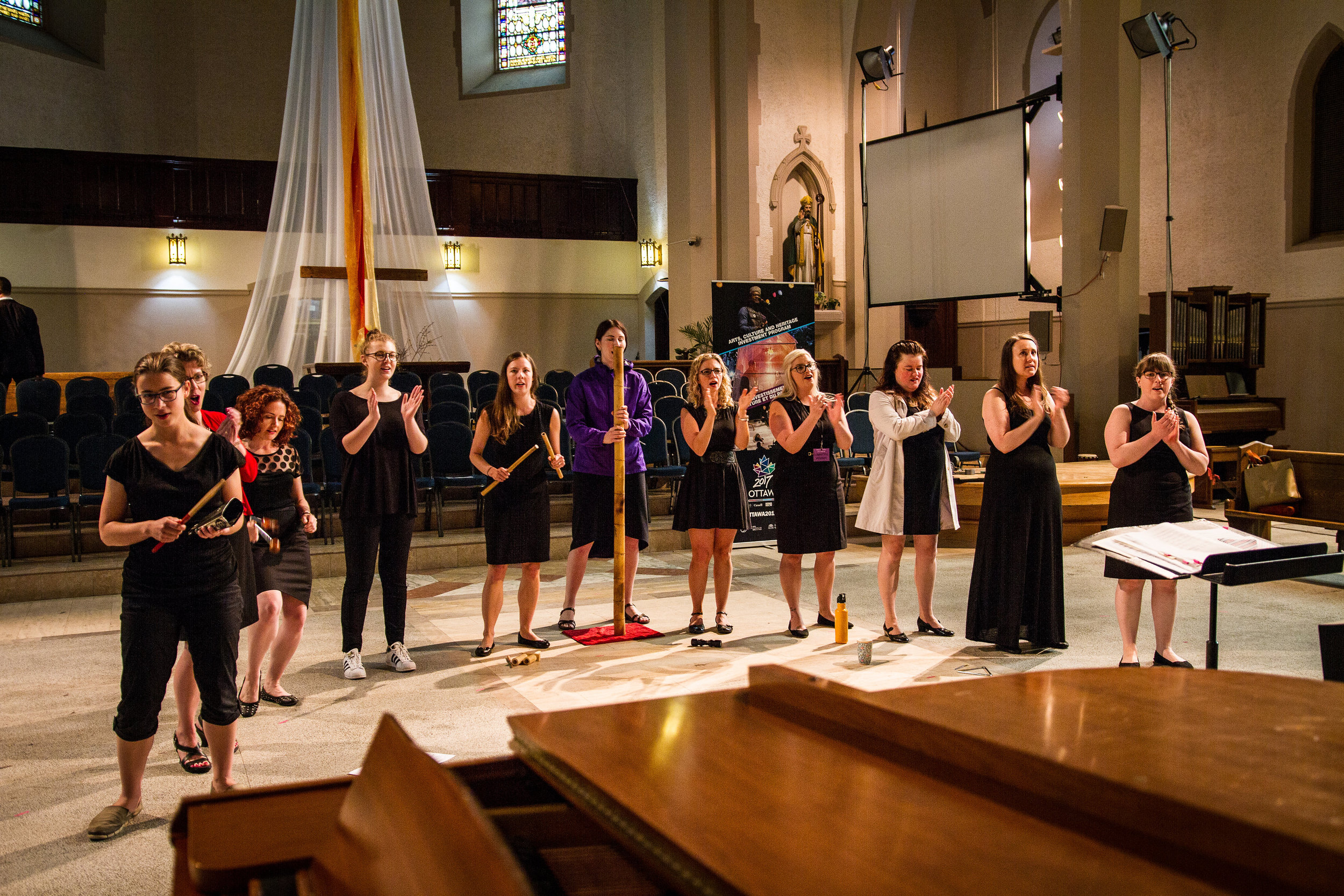  Rehearsing Stephen Hatfield's "Überlebensgross" before the final  Sing Ottawa en choeur &nbsp;festival concert.  Photo Credit:  Anthony Boxell Photography   
