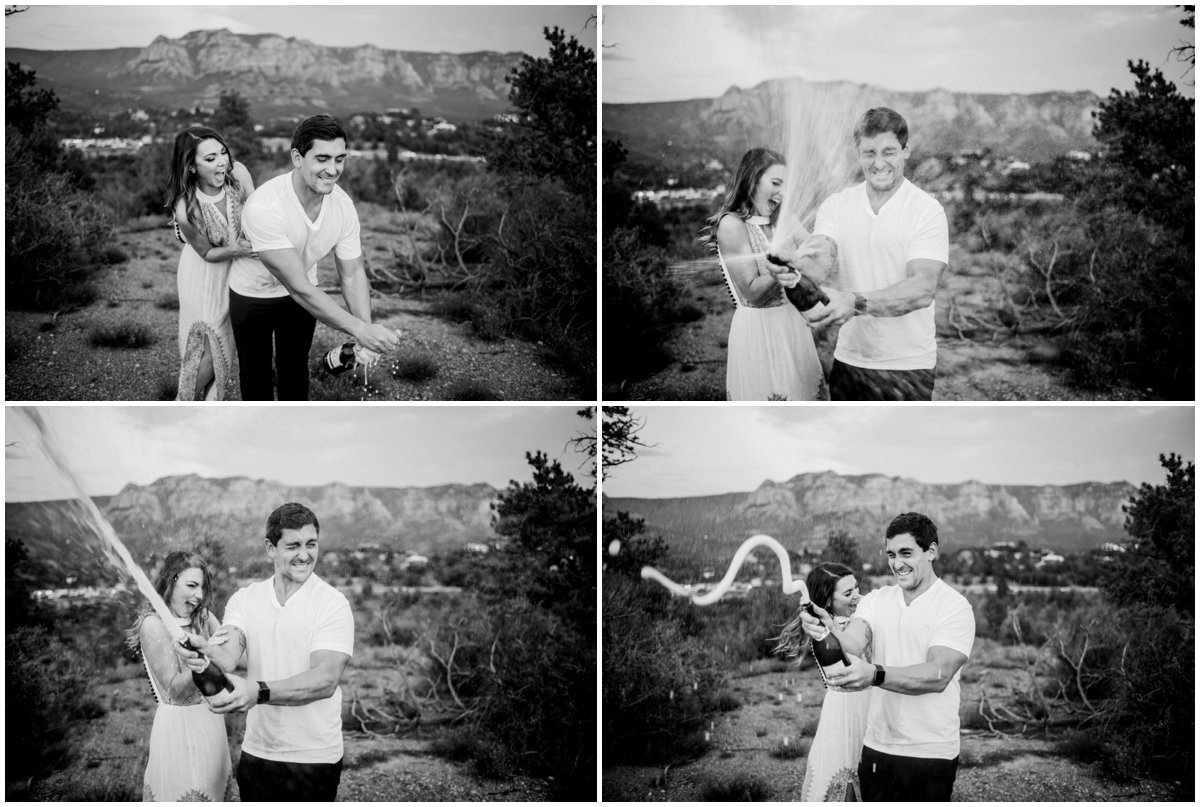  Summer Sedona Engagement Photos Popping Champagne with Sedona Red Rock Mountains in the background. 