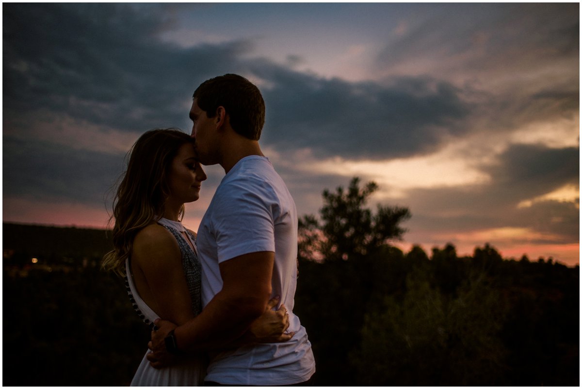  Dramatic Sunset Sedona Engagement Photos with Sedona Red Rock Mountains in the background. 