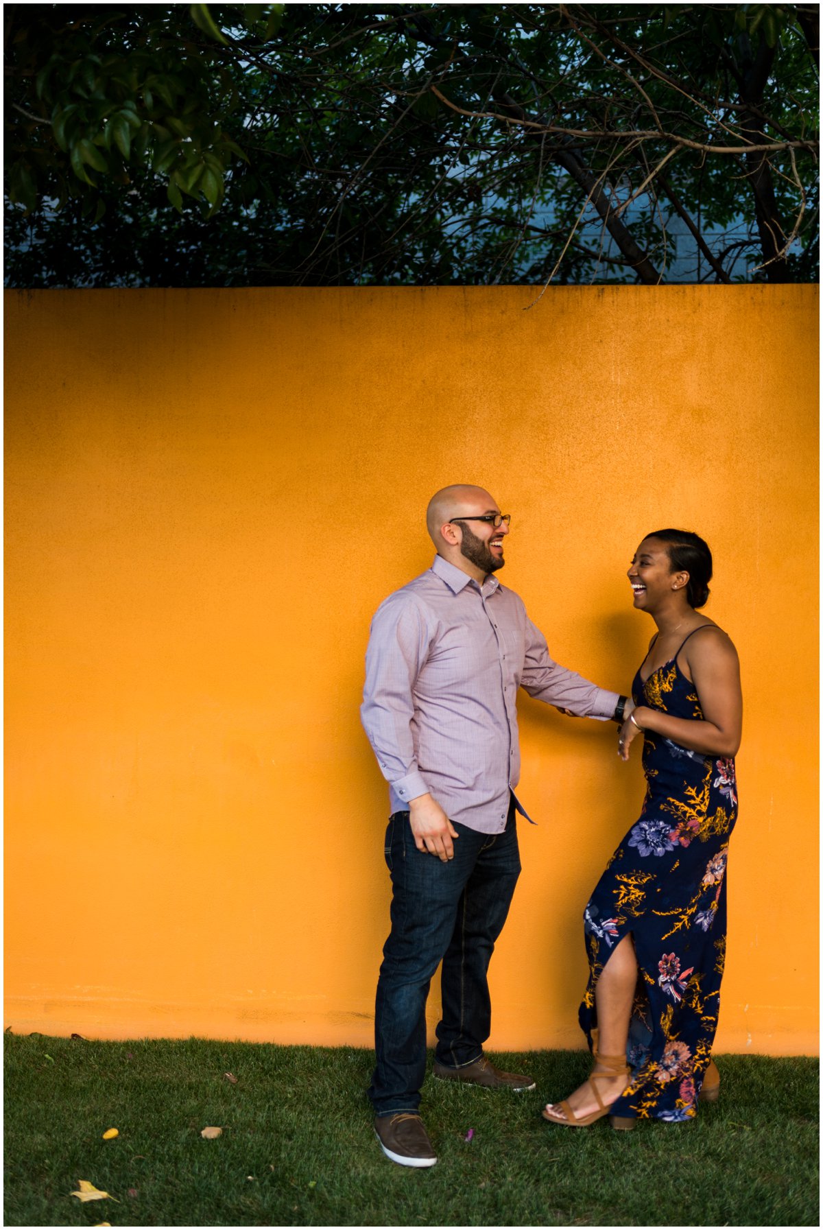  Interracial Couple Engagement Photos in Mesa with a colorful wall.&nbsp; 