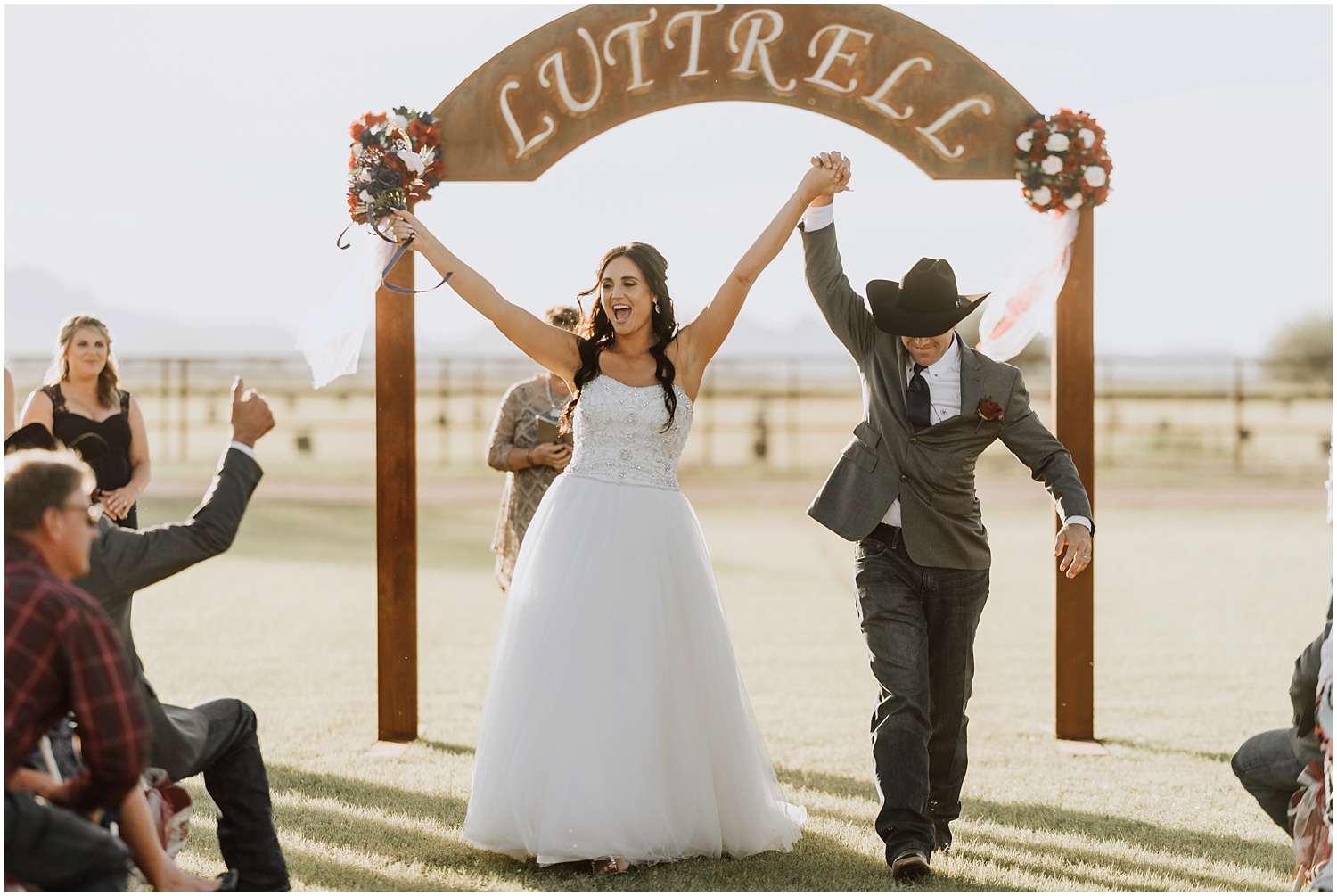 Bride and groom celebrate after getting announced husband and wife.