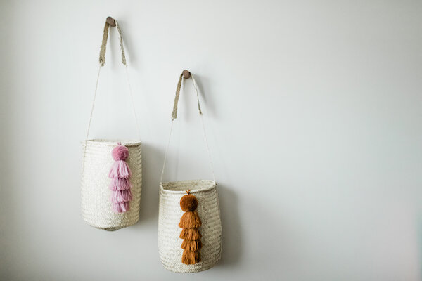 Wooden Pegs &amp; Hand-Woven Baskets Add Interest &amp; Storage