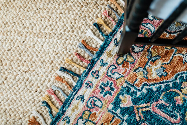 Layering Rugs and Textures Adds Warmth &amp; Interest