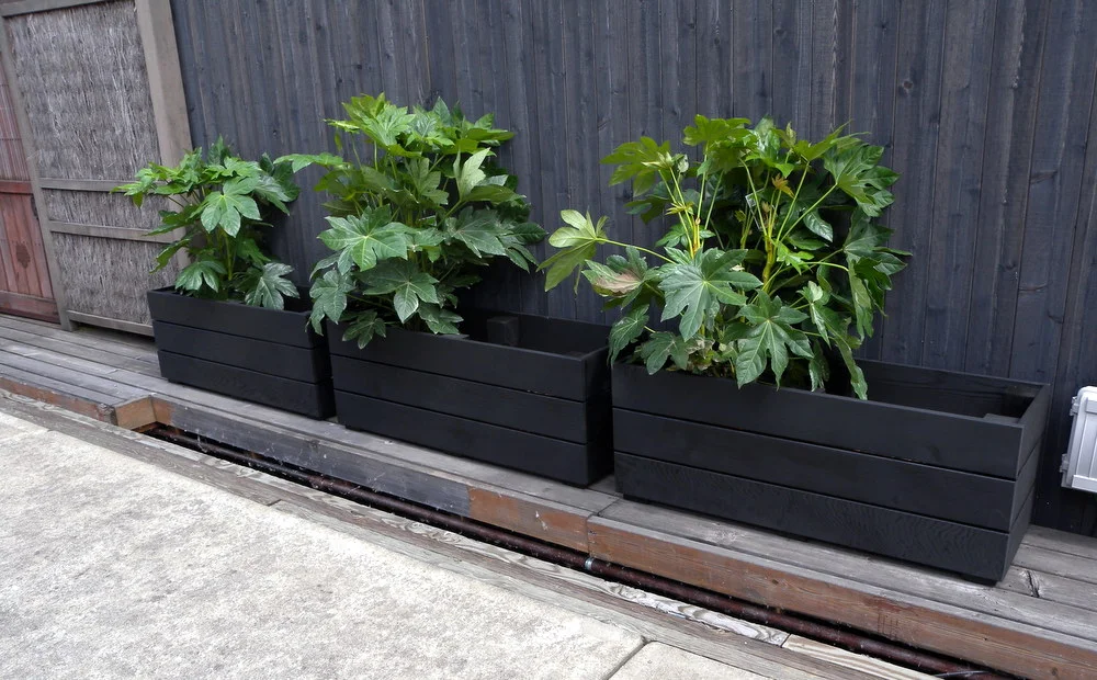 Planters for a houseboat