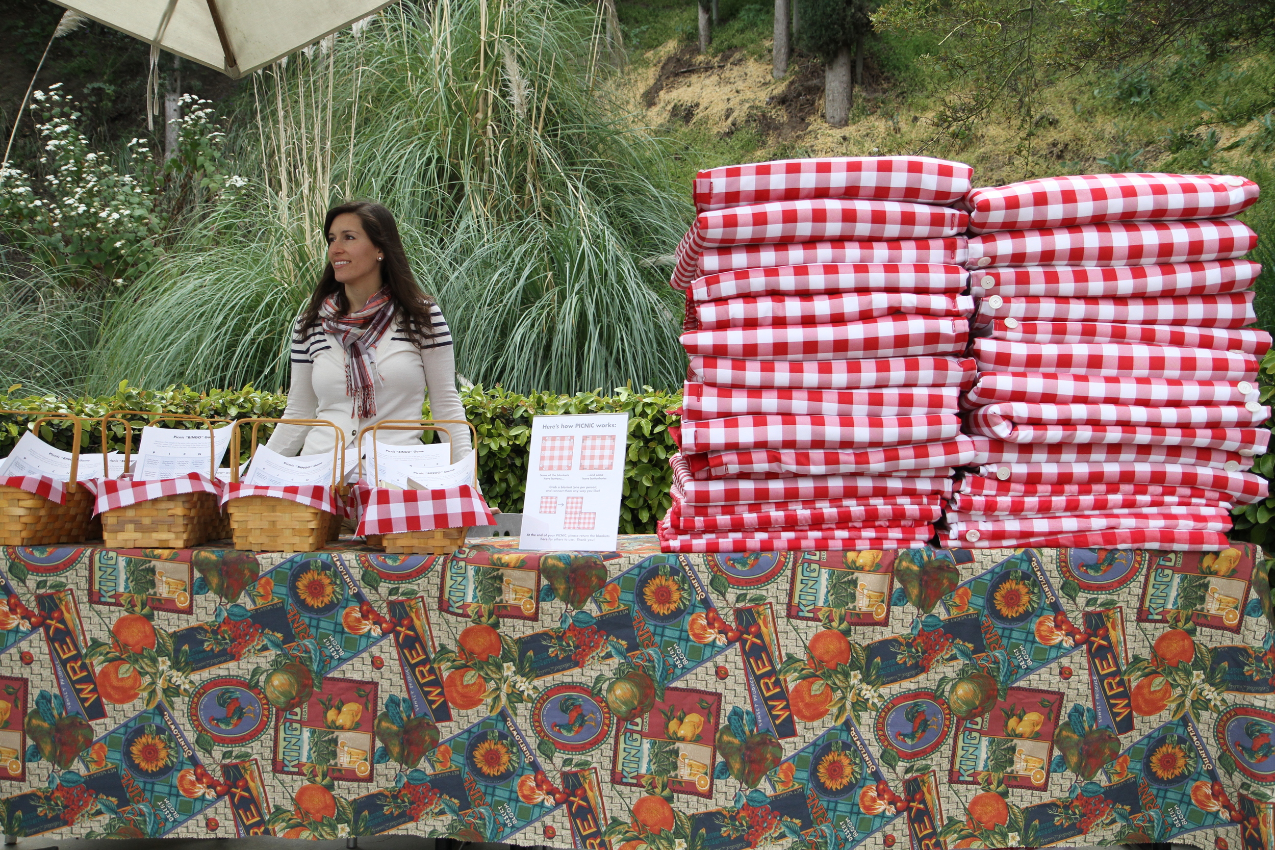   Picnic  Fabric, batting, buttons (52 count) 42x42 inch squares Documentation of interactive installation (distribution table) Skirball Cultural Center, Los Angeles, CA, March 30-31, 2013 