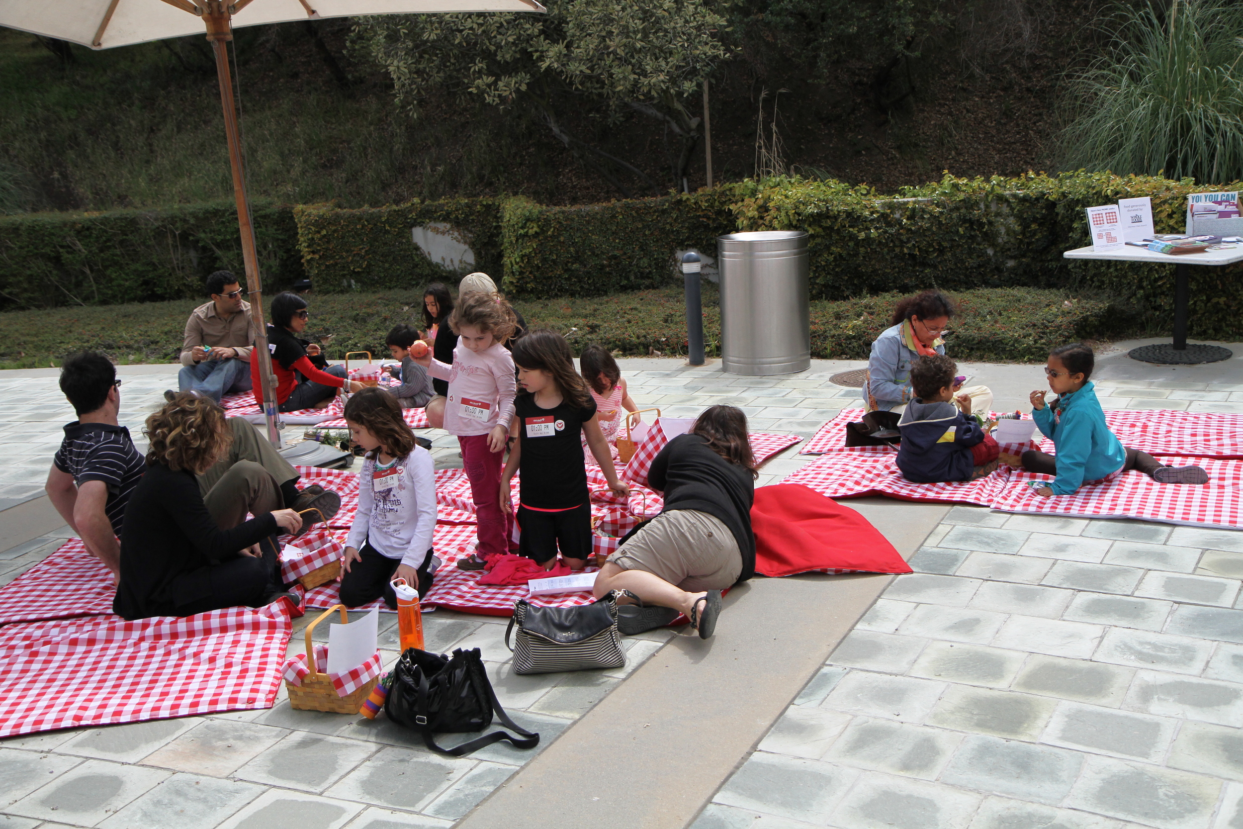   Picnic  Fabric, batting, buttons (52 count) 42x42 inch squares Documentation of interactive installation (audience participation) Skirball Cultural Center, Los Angeles, CA, March 30-31, 2013 