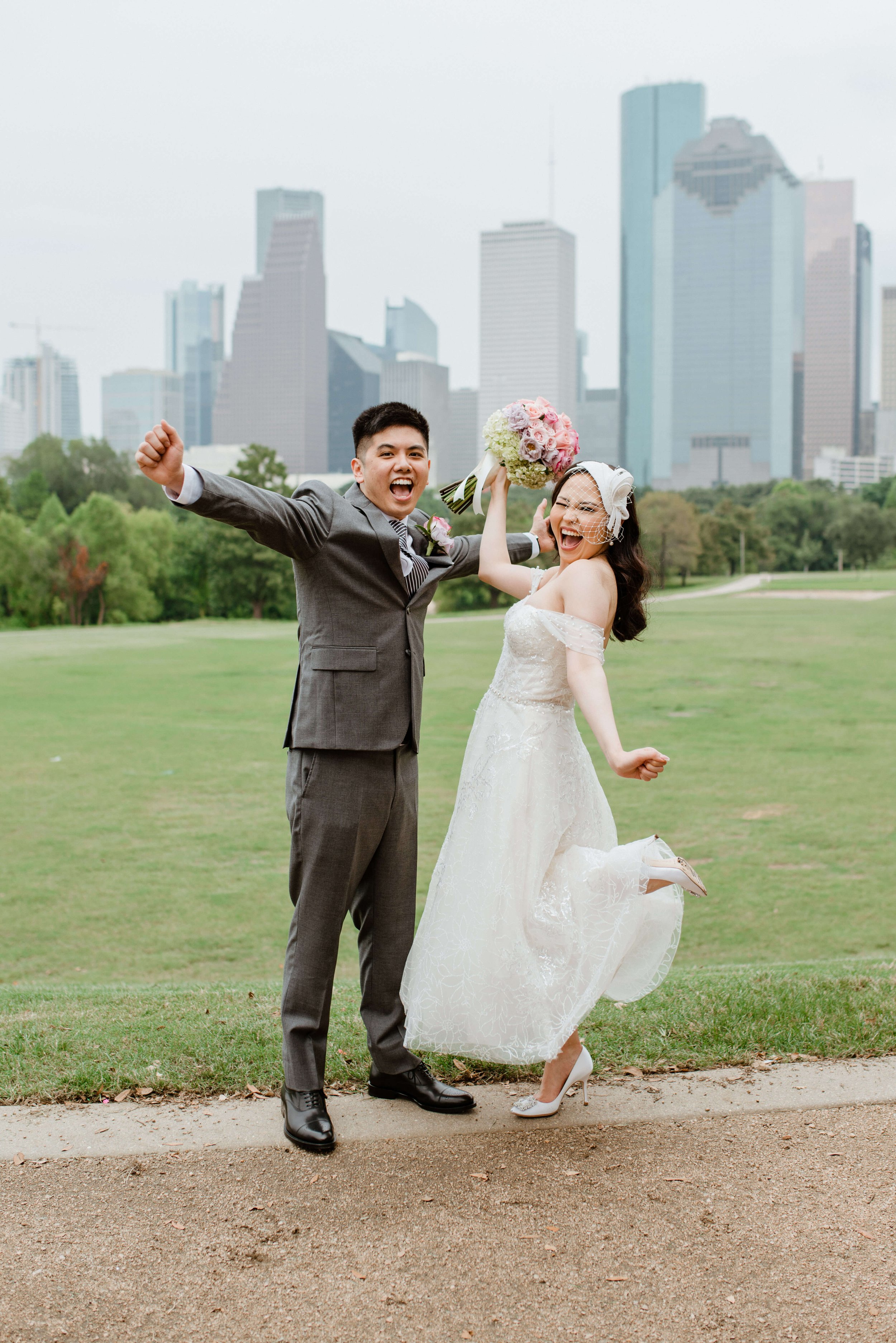 Just married Elopement photos with the Houston skyline photographed by J. Andrade Visual Arts