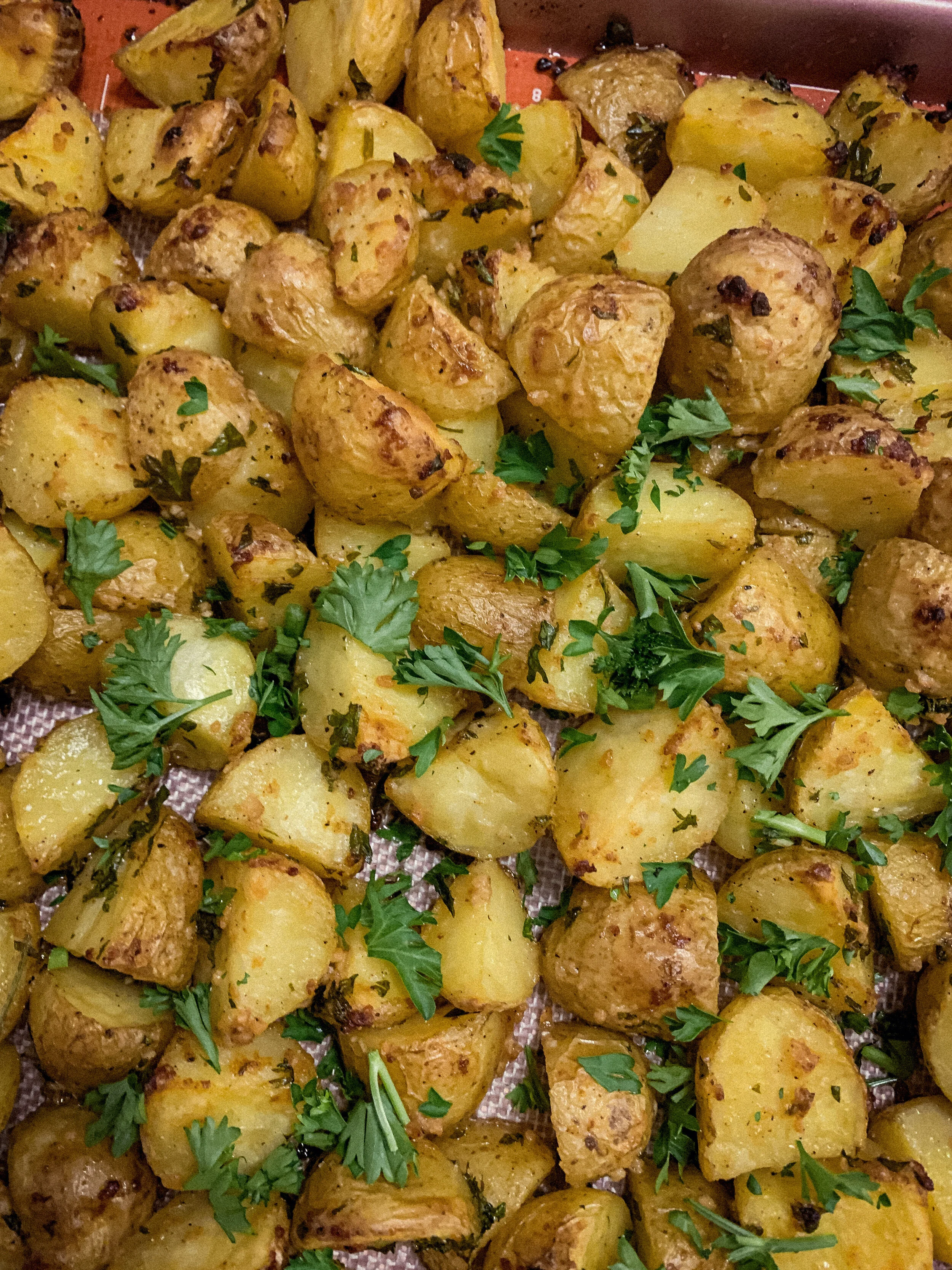 CRISPY ROASTED POTATOES WITH PARMESAN AND GARLIC 